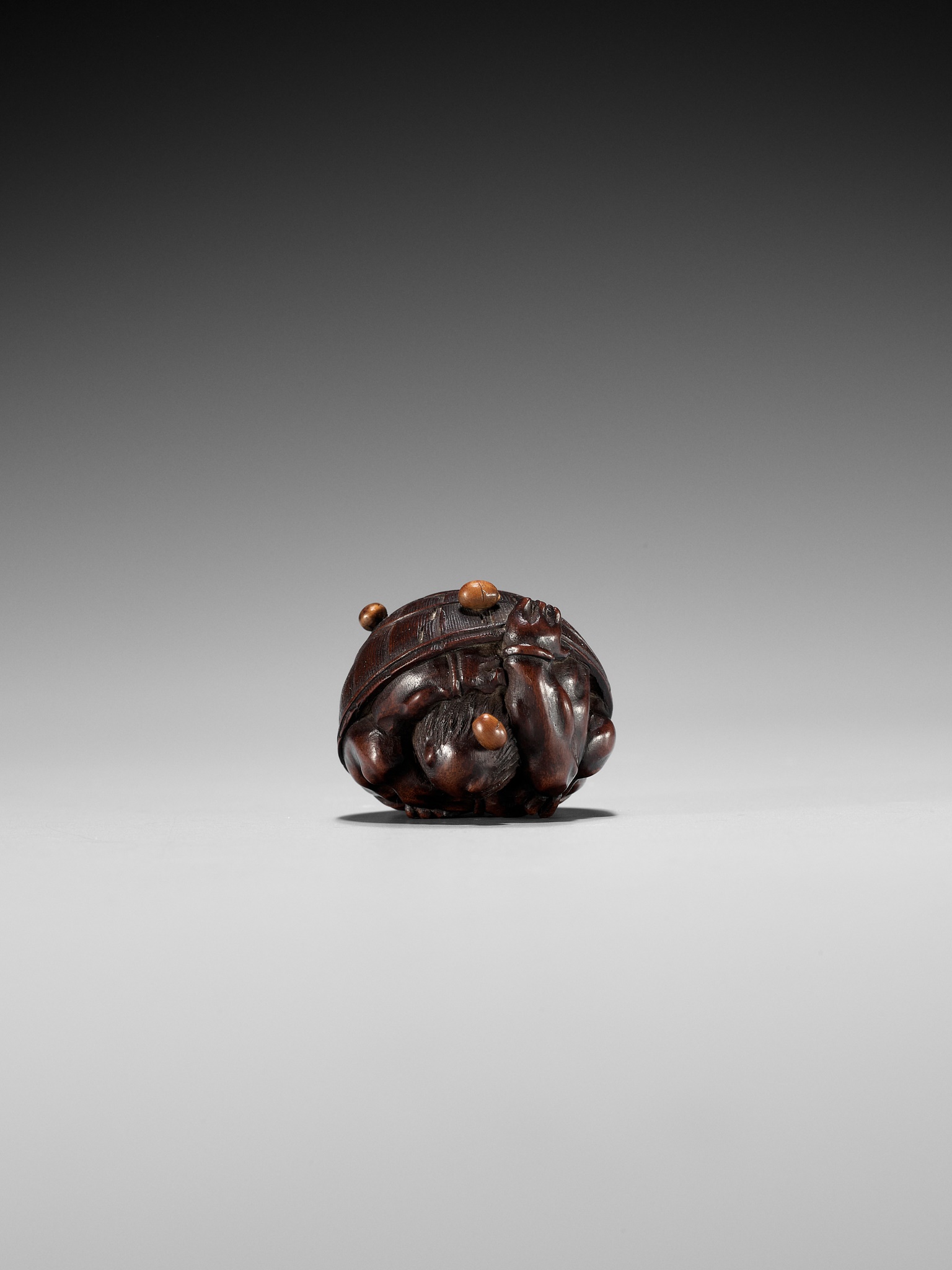 MASAKAZU: A WOOD NETSUKE OF A COWERING ONI DURING SETSUBUN - Image 7 of 13