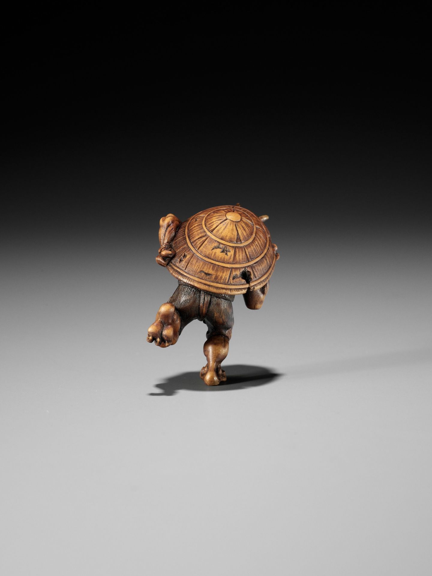 A WOOD NETSUKE OF AN ONI AT SETSUBUN, ATTRIBUTED TO ROKKO - Image 6 of 9