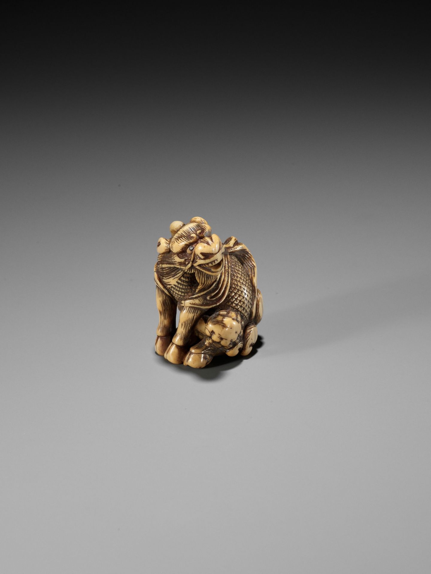 GYOKUZAN: AN IVORY NETSUKE OF A KIRIN - Image 12 of 14