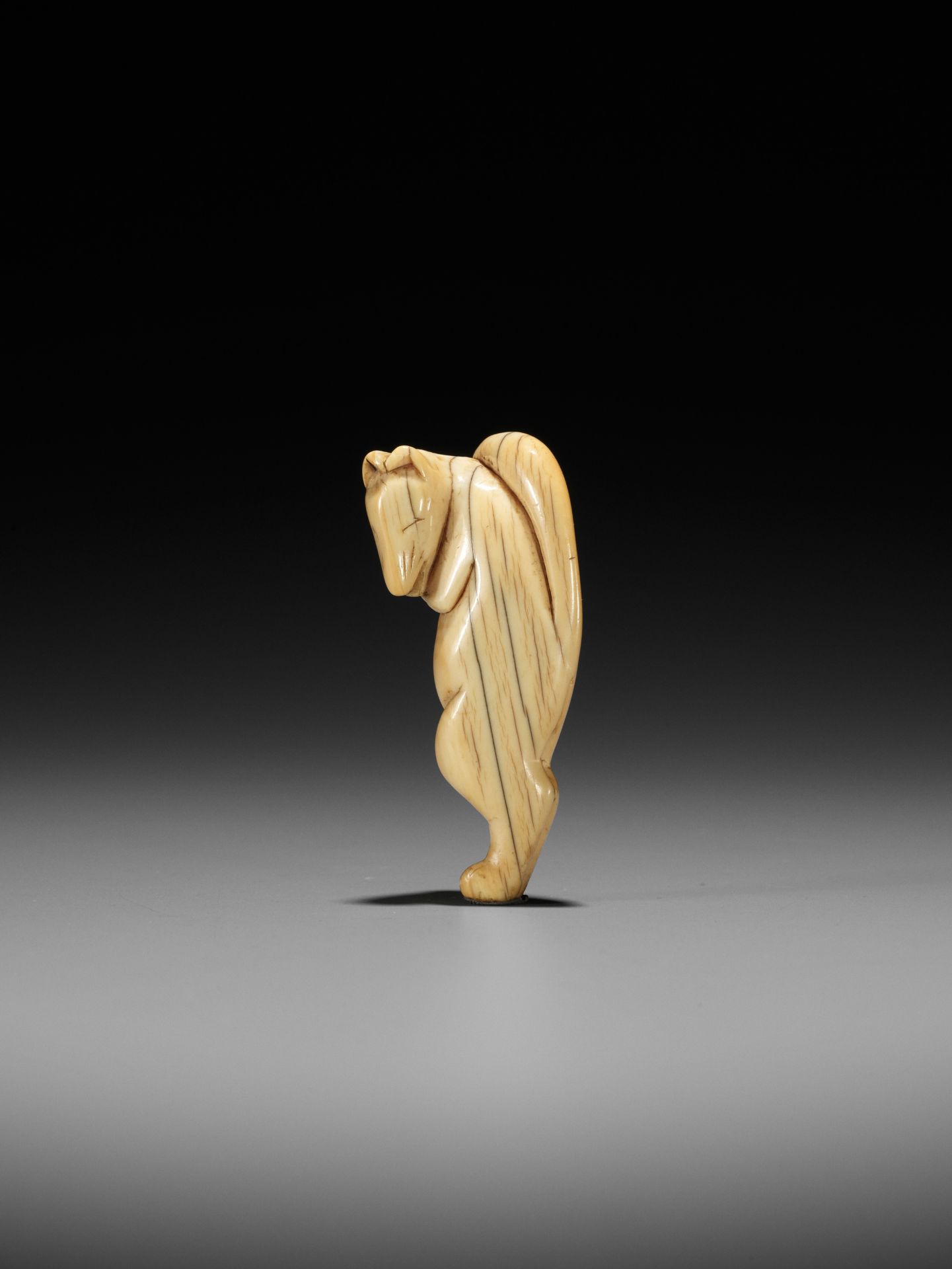 A GOOD IVORY NETSUKE OF A DANCING KITSUNE - Bild 9 aus 11