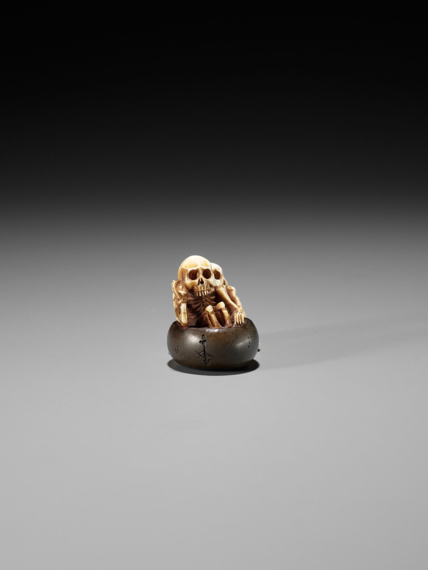 HIDEYUKI: A RARE IVORY AND LACQUER NETSUKE OF BATHING SKELETONS - Image 6 of 11