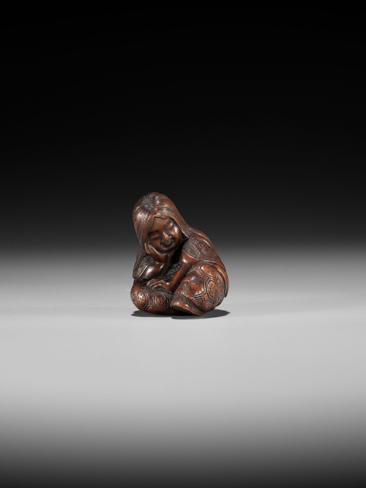 MASATOSHI: A NAGOYA SCHOOL WOOD NETSUKE OF A SLUMBERING SHOJO - Image 2 of 14