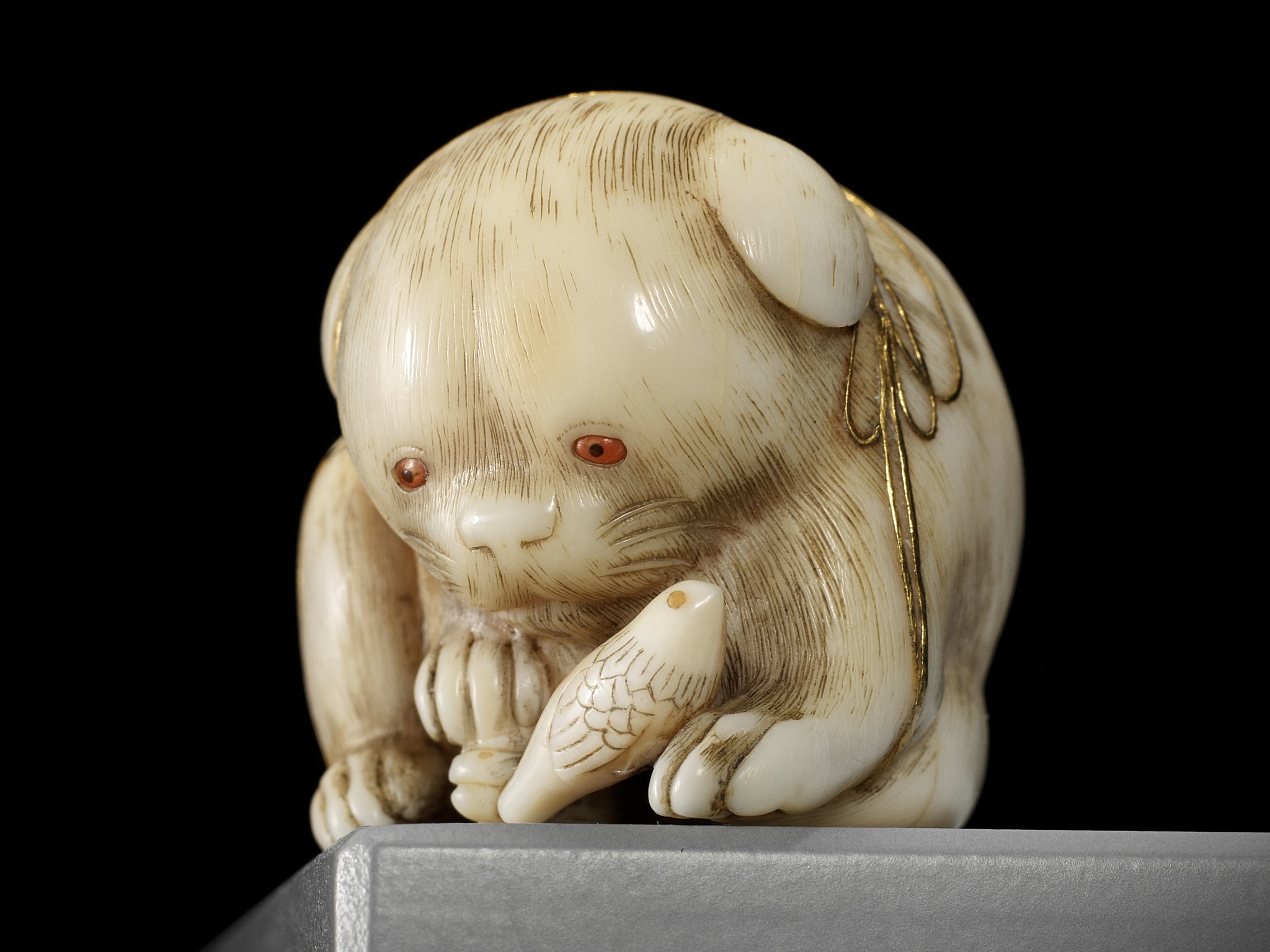 KAIGYOKUSAI MASATSUGU: A SUPERB IVORY NETSUKE OF A PUPPY WITH TOY BIRD - Image 14 of 16