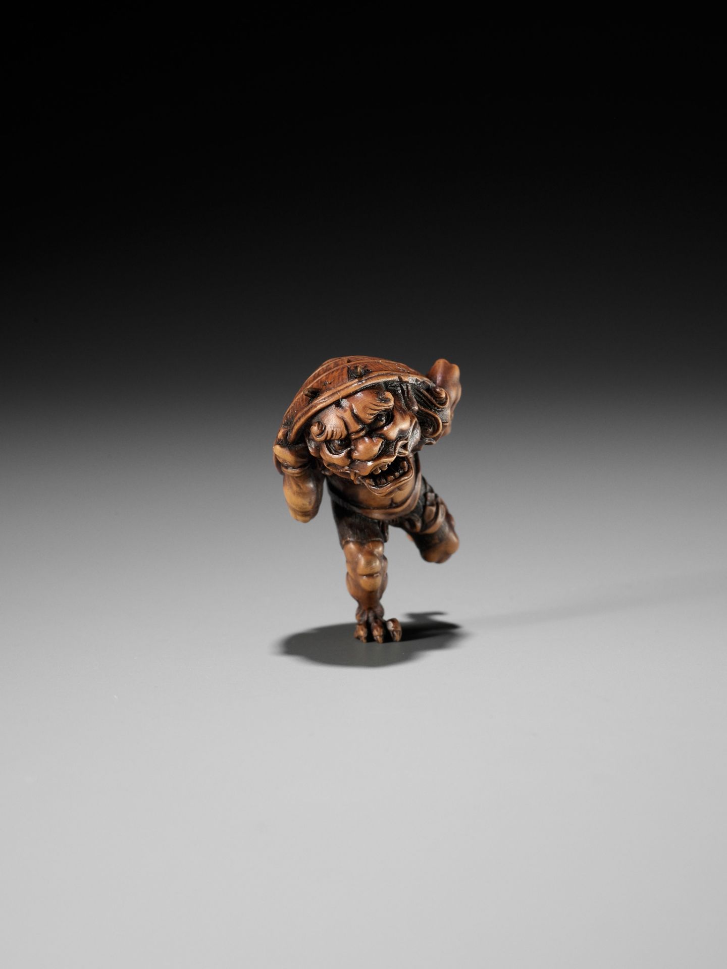 A WOOD NETSUKE OF AN ONI AT SETSUBUN, ATTRIBUTED TO ROKKO - Image 7 of 9