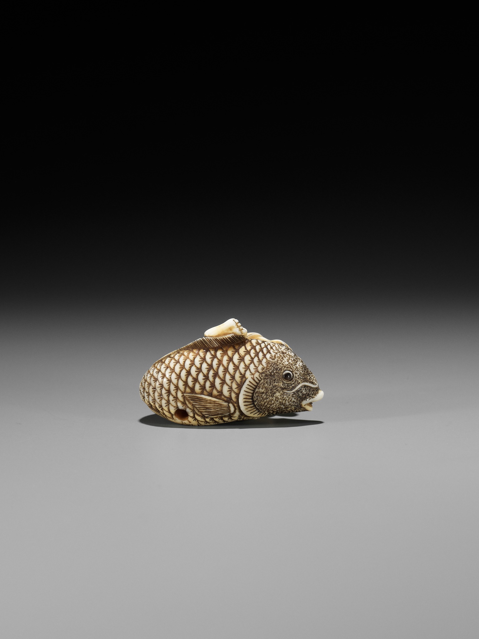 MASAMINE: A FINE OSAKA SCHOOL IVORY NETSUKE OF A FISHERMAN STRUGGLING WITH A HUGE CARP - Image 11 of 14