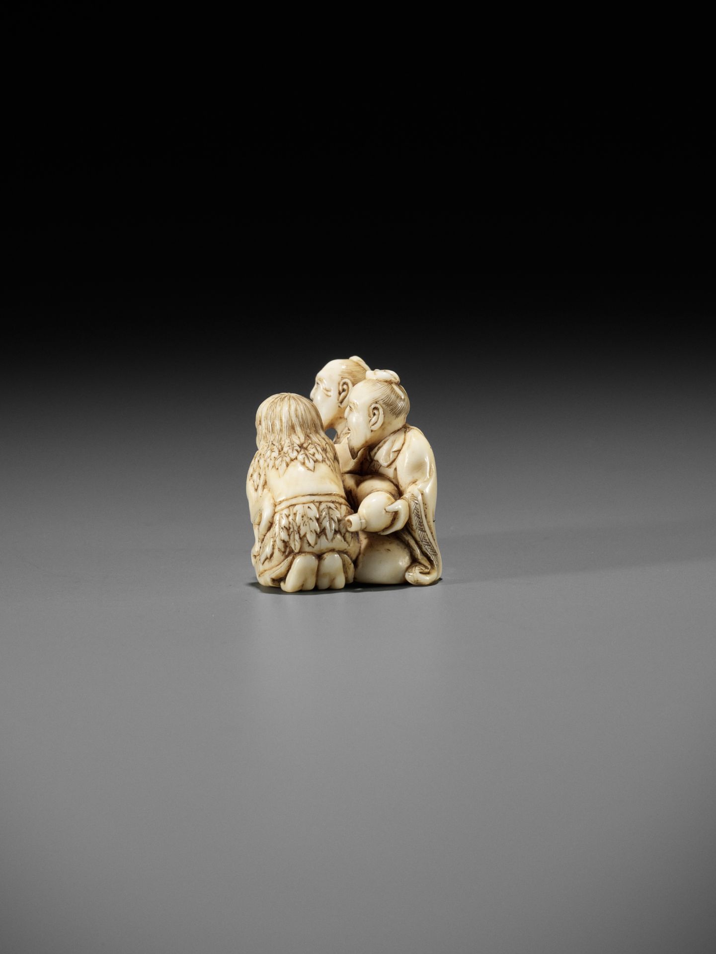 IKKOSAI: AN AMUSING IVORY NETSUKE OF GAMA, CHOKARO, AND TEKKAI SENNIN - Image 9 of 12