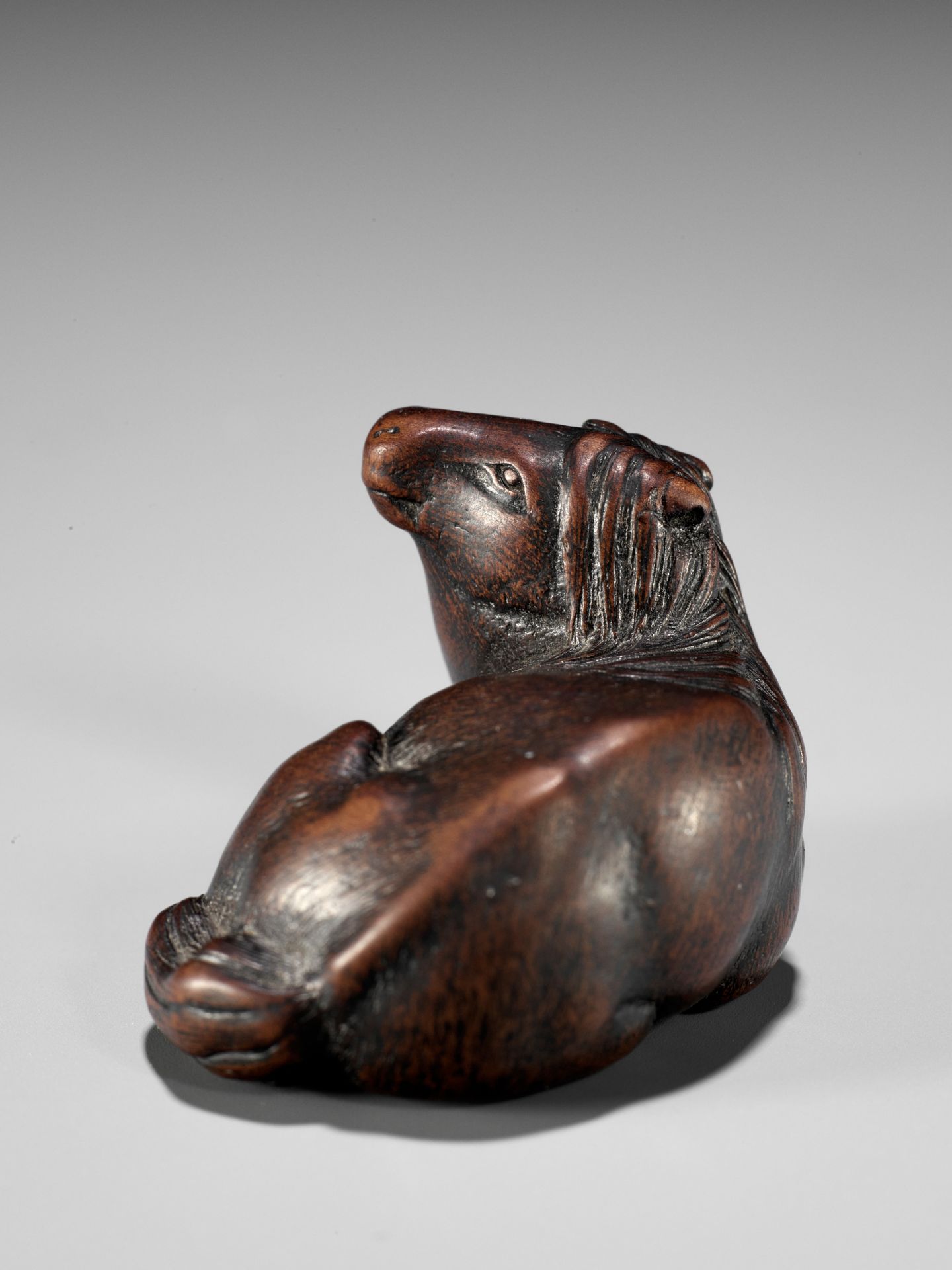 MASAMARU: A FINE WOOD NETSUKE OF A RECUMBENT HORSE - Image 5 of 10