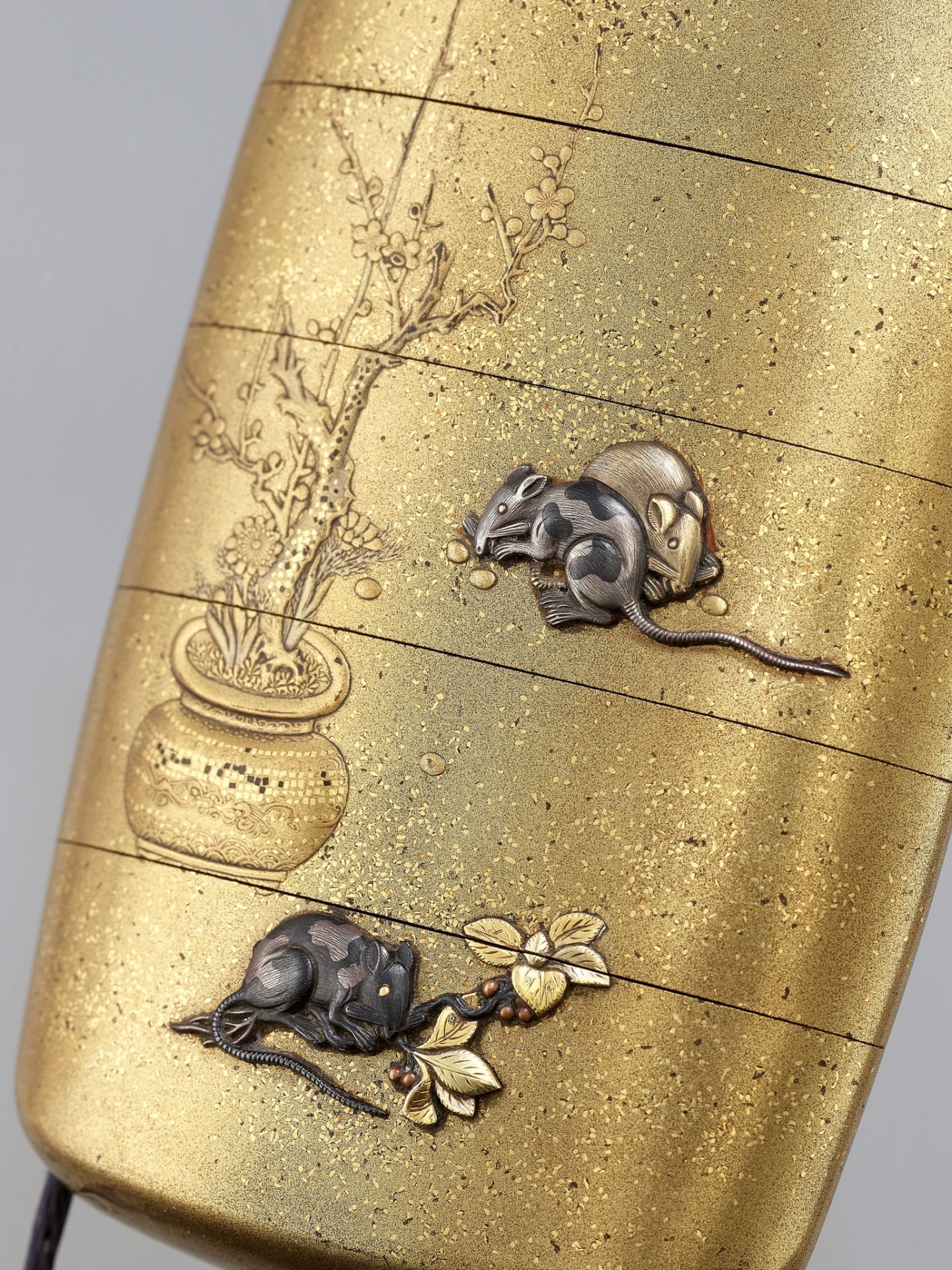 A FINE METAL-INLAID GOLD LACQUER FOUR-CASE INRO DEPICTING RATS AND HORSES