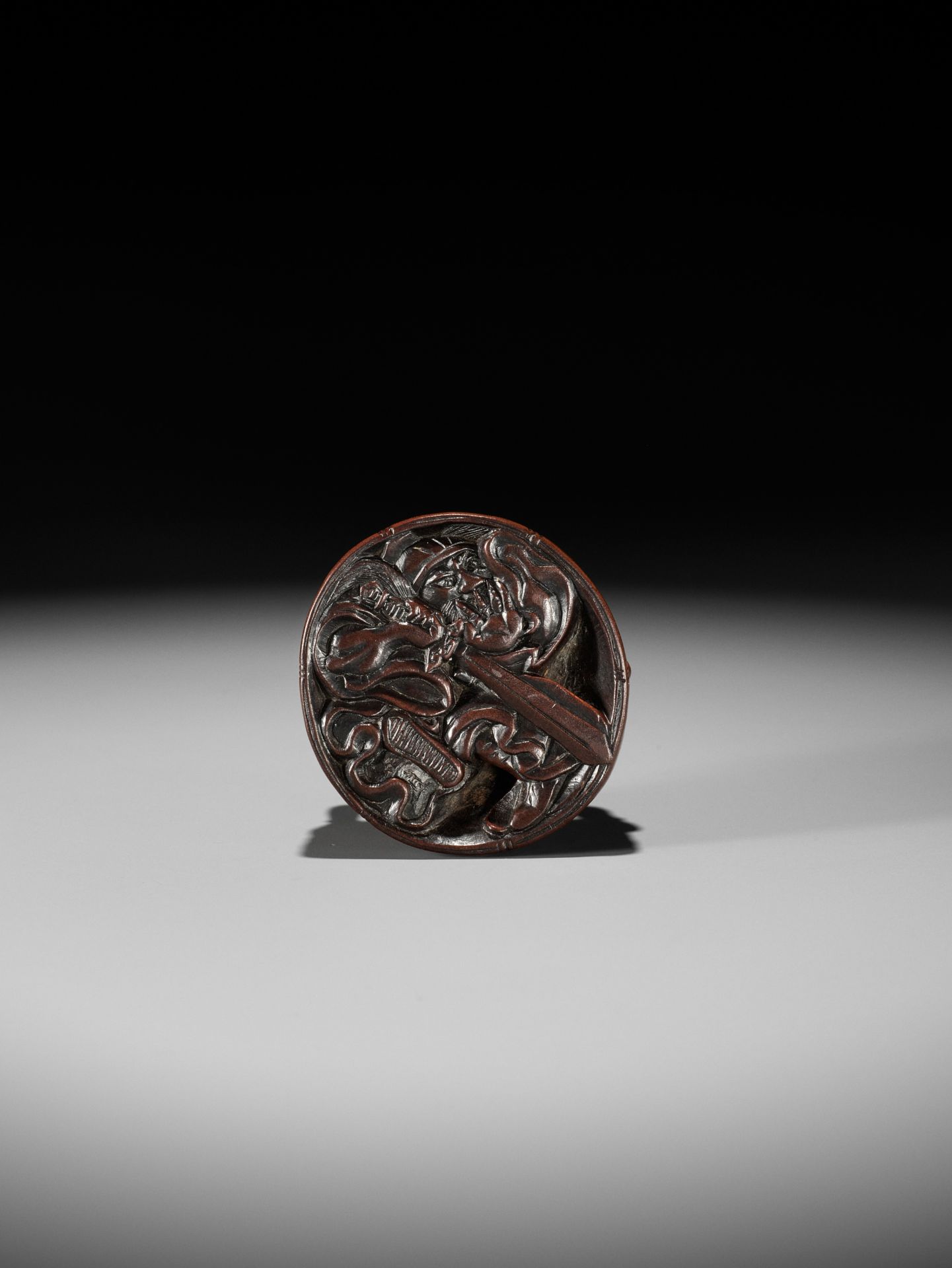 MASANAO: A RARE WOOD NETSUKE OF AN ONI TRAPPING SHOKI - Image 13 of 14