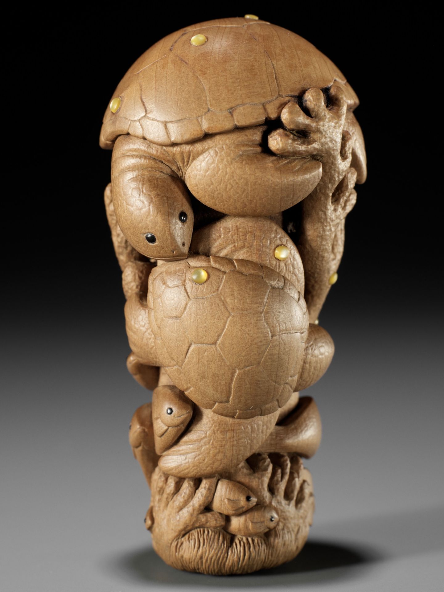 DOUG MARSDEN: AN INLAID WOOD NETSUKE OF TURTLES AND OTHER MARINE LIFE, 'PACIFIC JEWEL'