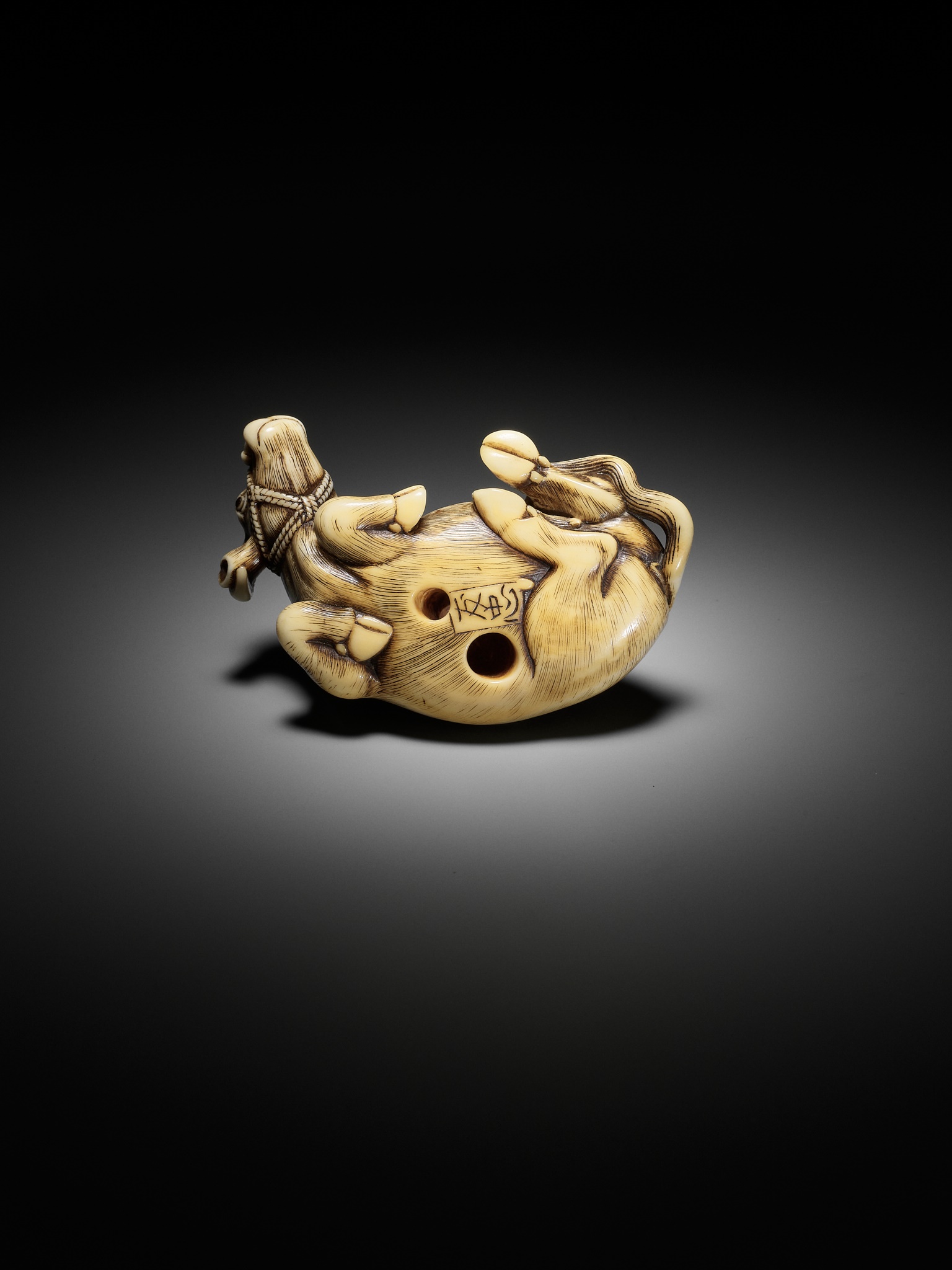 TOMOTADA: A SUPERB IVORY NETSUKE OF A RECUMBENT COW - Image 4 of 18