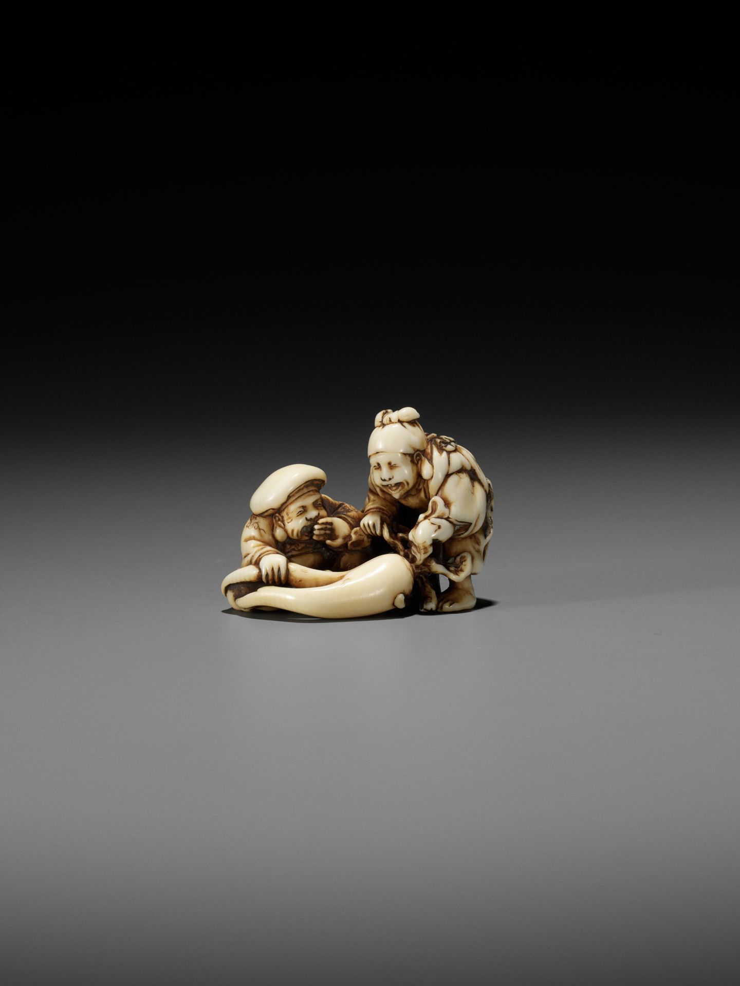 IKKOSAI: AN AMUSING IVORY SHUNGA NETSUKE OF DAIKOKU AND EBISU - Image 5 of 12