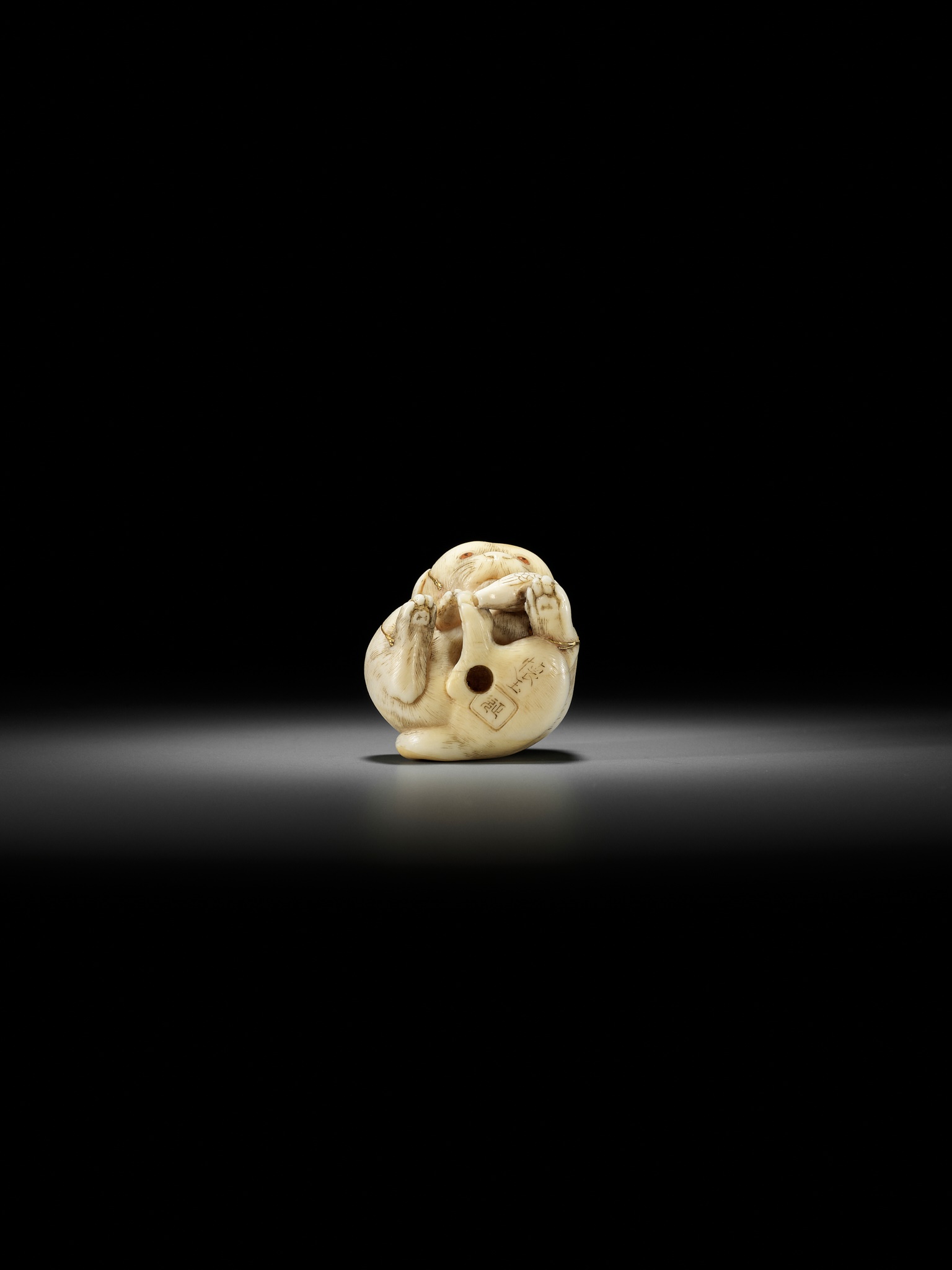 KAIGYOKUSAI MASATSUGU: A SUPERB IVORY NETSUKE OF A PUPPY WITH TOY BIRD - Image 12 of 16