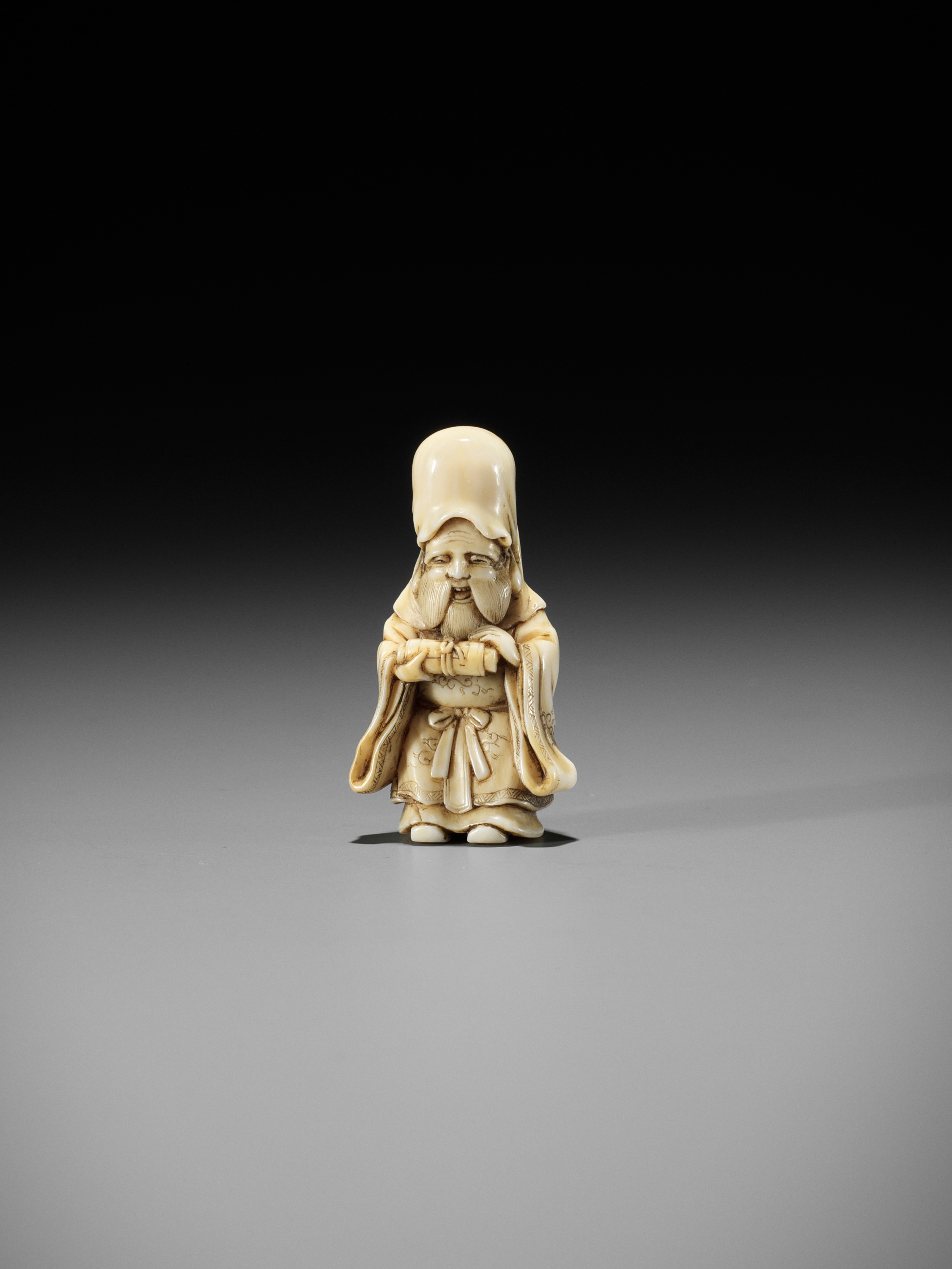 GYOKKOSAI: A FINE IVORY NETSUKE OF JUROJIN HOLDING A SCROLL - Image 3 of 13