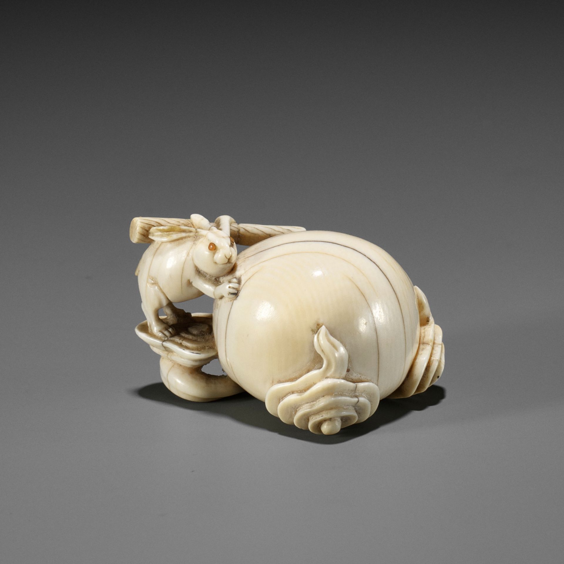 MASAHIRO: AN OSAKA SCHOOL IVORY NETSUKE OF THE LUNAR HARE