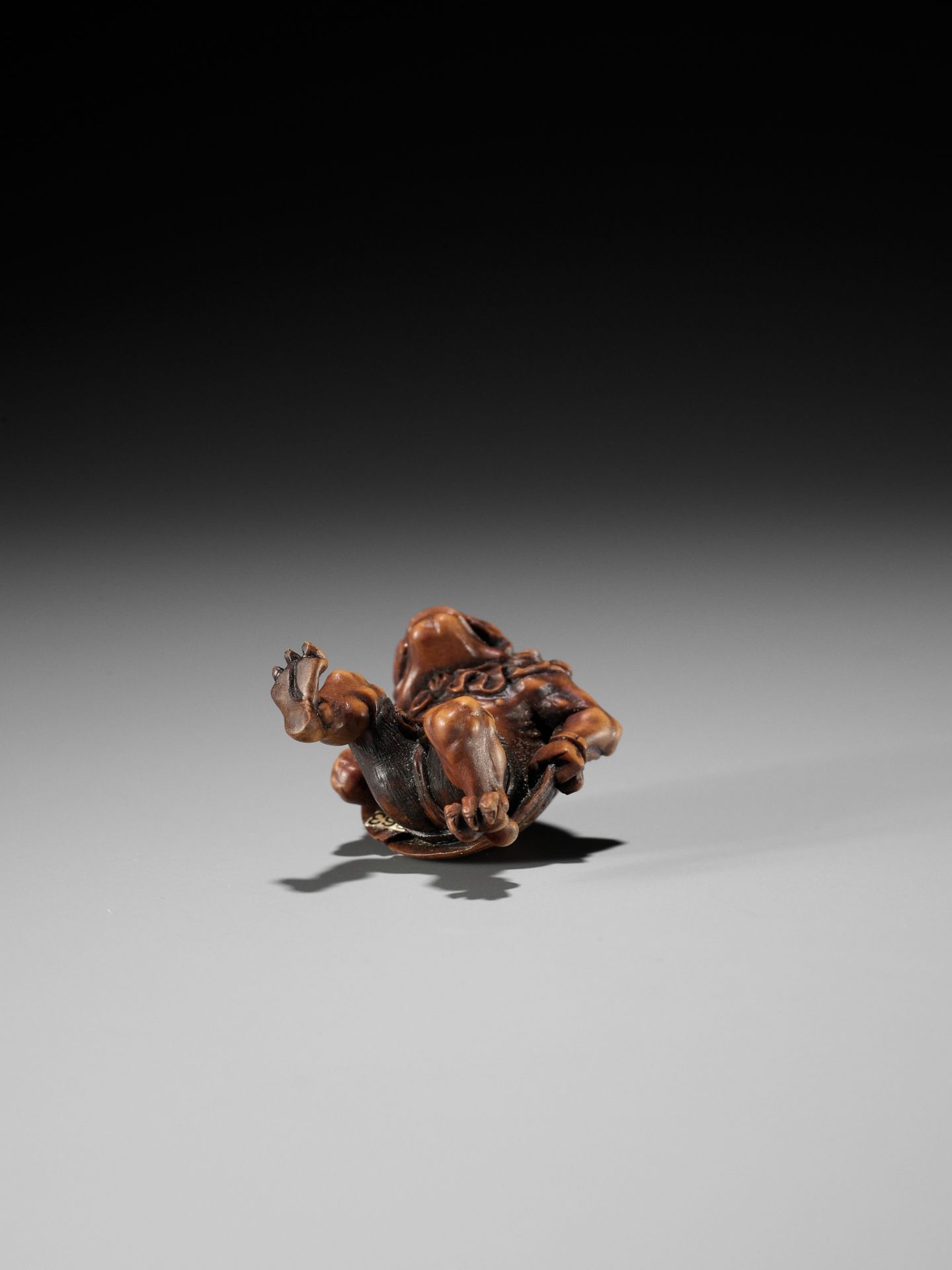 A WOOD NETSUKE OF AN ONI AT SETSUBUN, ATTRIBUTED TO ROKKO - Image 9 of 9