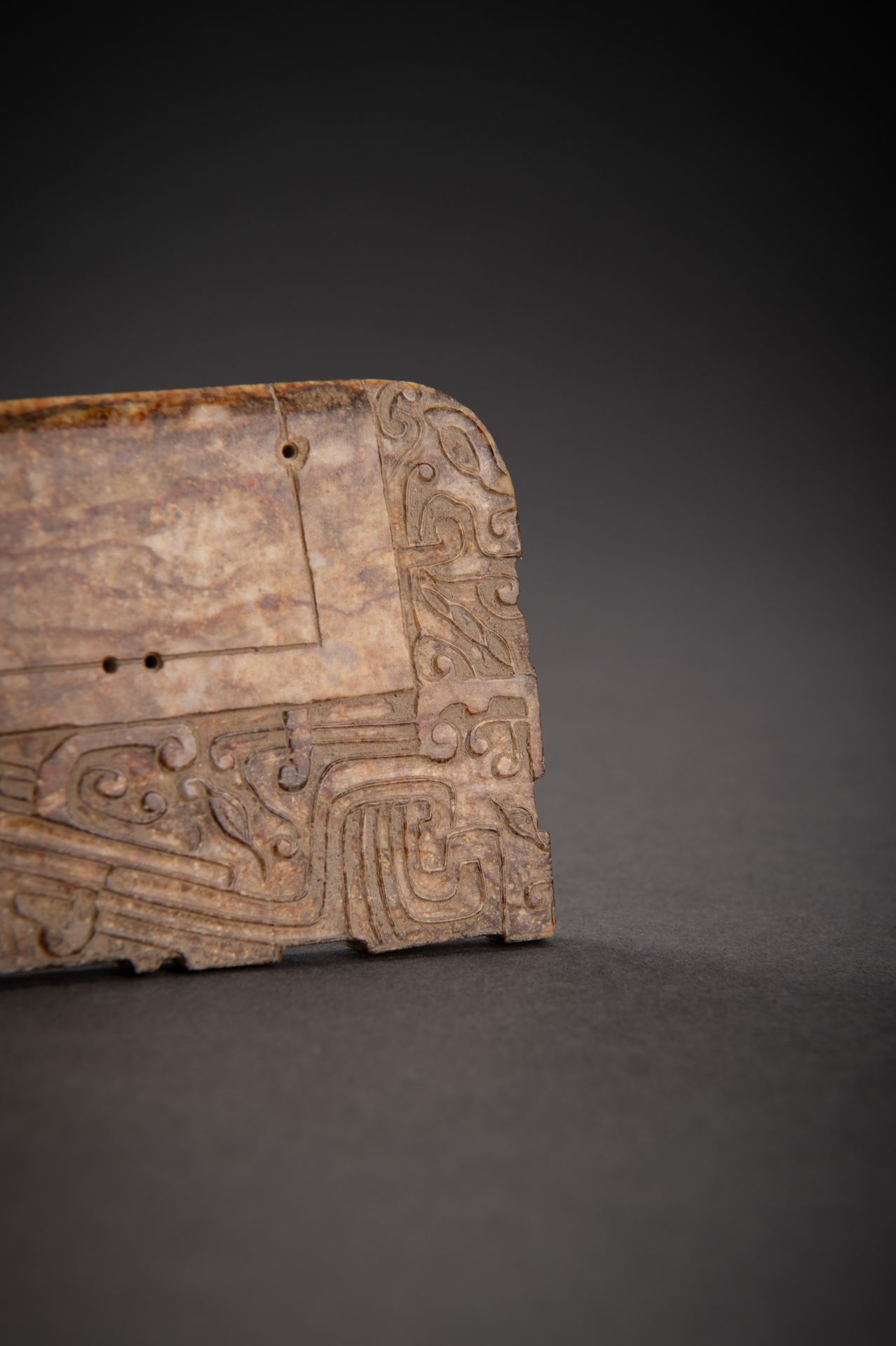 A FINELY DECORATED BROWN JADE AXE, QING - Image 6 of 13