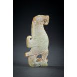 AN ARCHAISTIC CELADON JADE 'BIRD' PENDANT