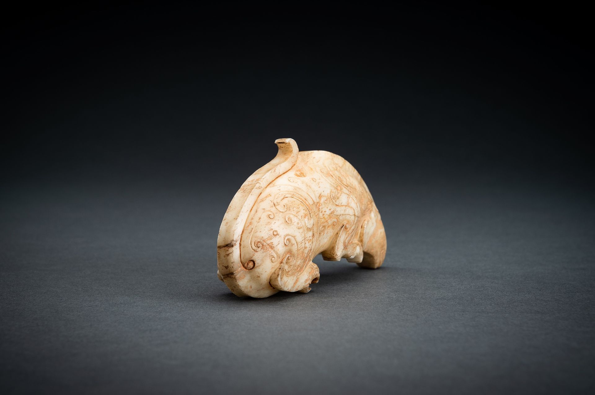 AN ARCHAISTIC CREAM JADE FIGURE OF A MYTHICAL BEAST - Image 11 of 14