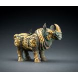 AN ARCHAISTIC FIRE-GILT COPPER REPOUSSÃ‰ VESSEL OF A RHINOCEROS