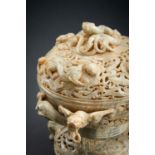 A LARGE AND IMPRESSIVE 3-PART RETICULATED CELADON JADE VESSEL
