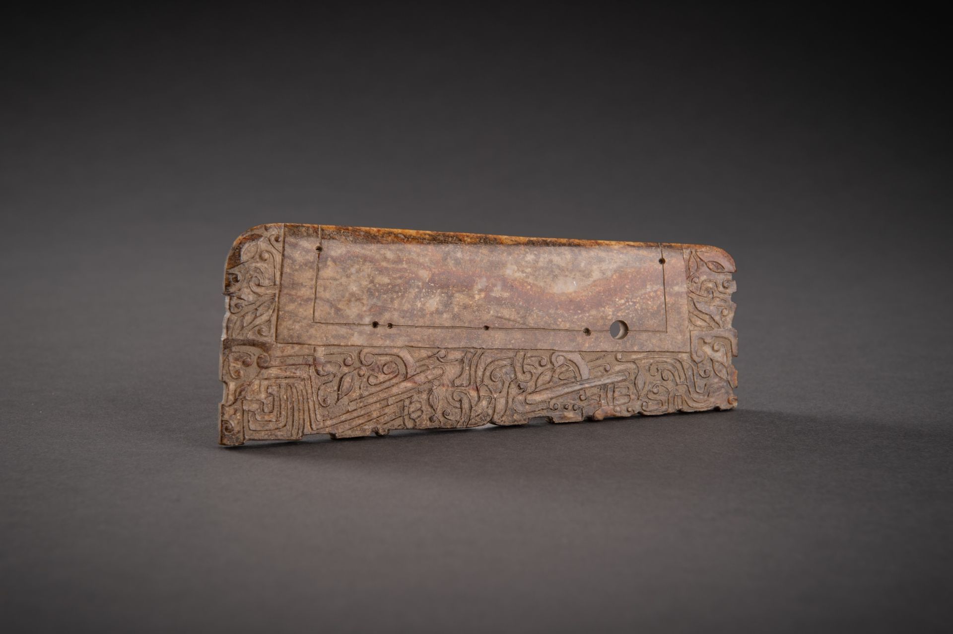 A FINELY DECORATED BROWN JADE AXE, QING - Image 13 of 13