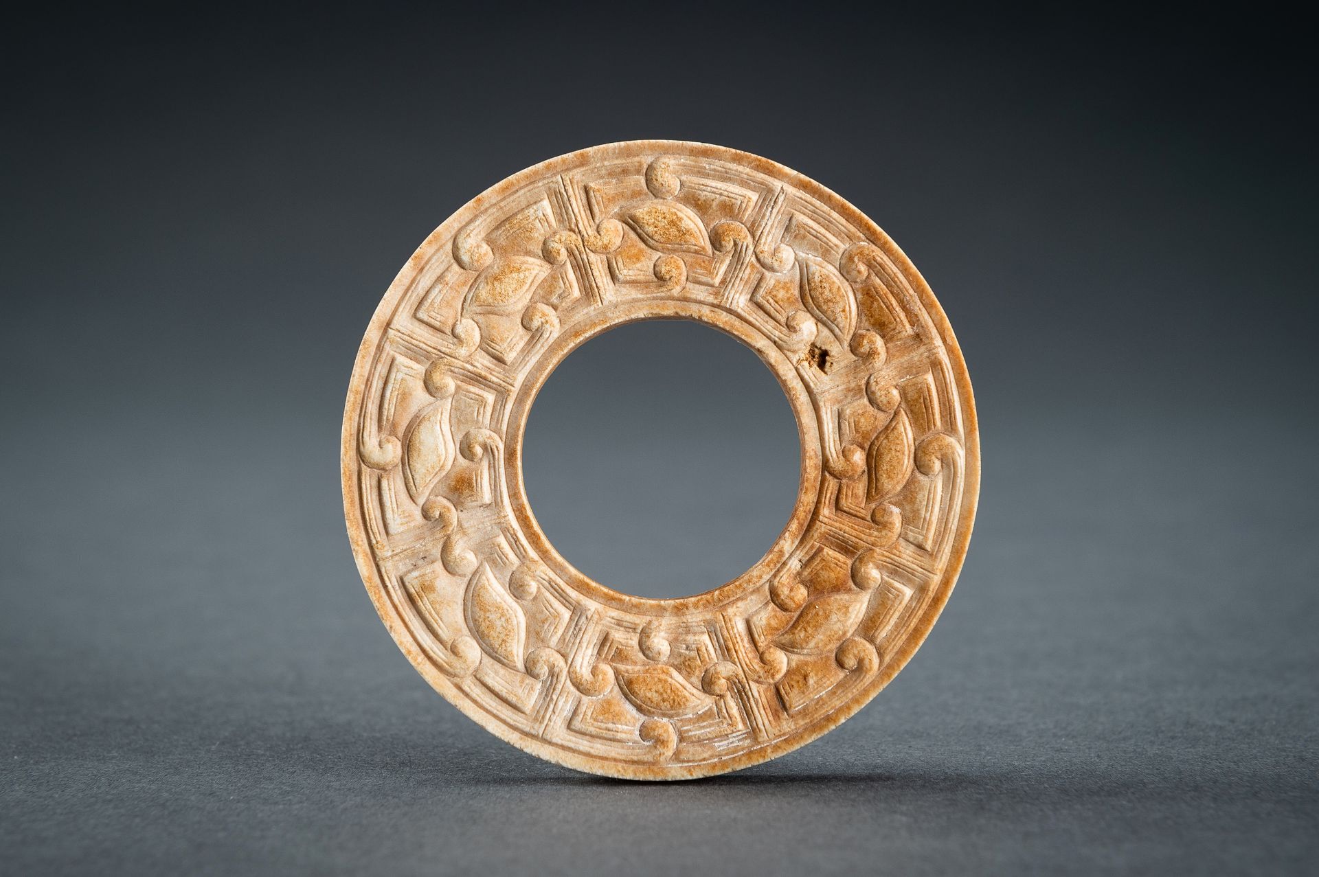 A SMALL OCHRE JADE ARCHAISTIC BI DISC, QING - Image 11 of 15