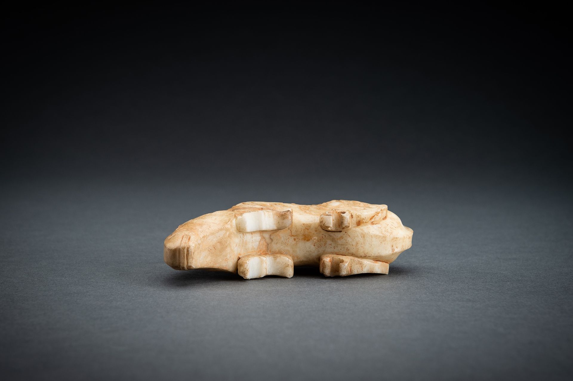 AN ARCHAISTIC CREAM JADE FIGURE OF A MYTHICAL BEAST - Image 14 of 14