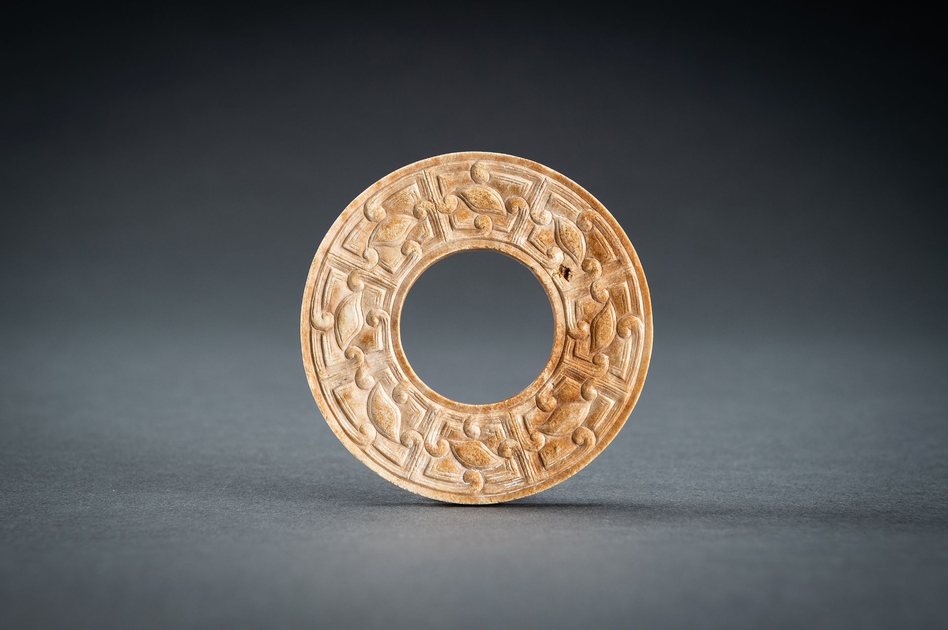 A SMALL OCHRE JADE ARCHAISTIC BI DISC, QING - Image 12 of 15