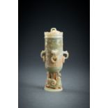 A SMALL ARCHAISTIC CELADON JADE VASE AND COVER