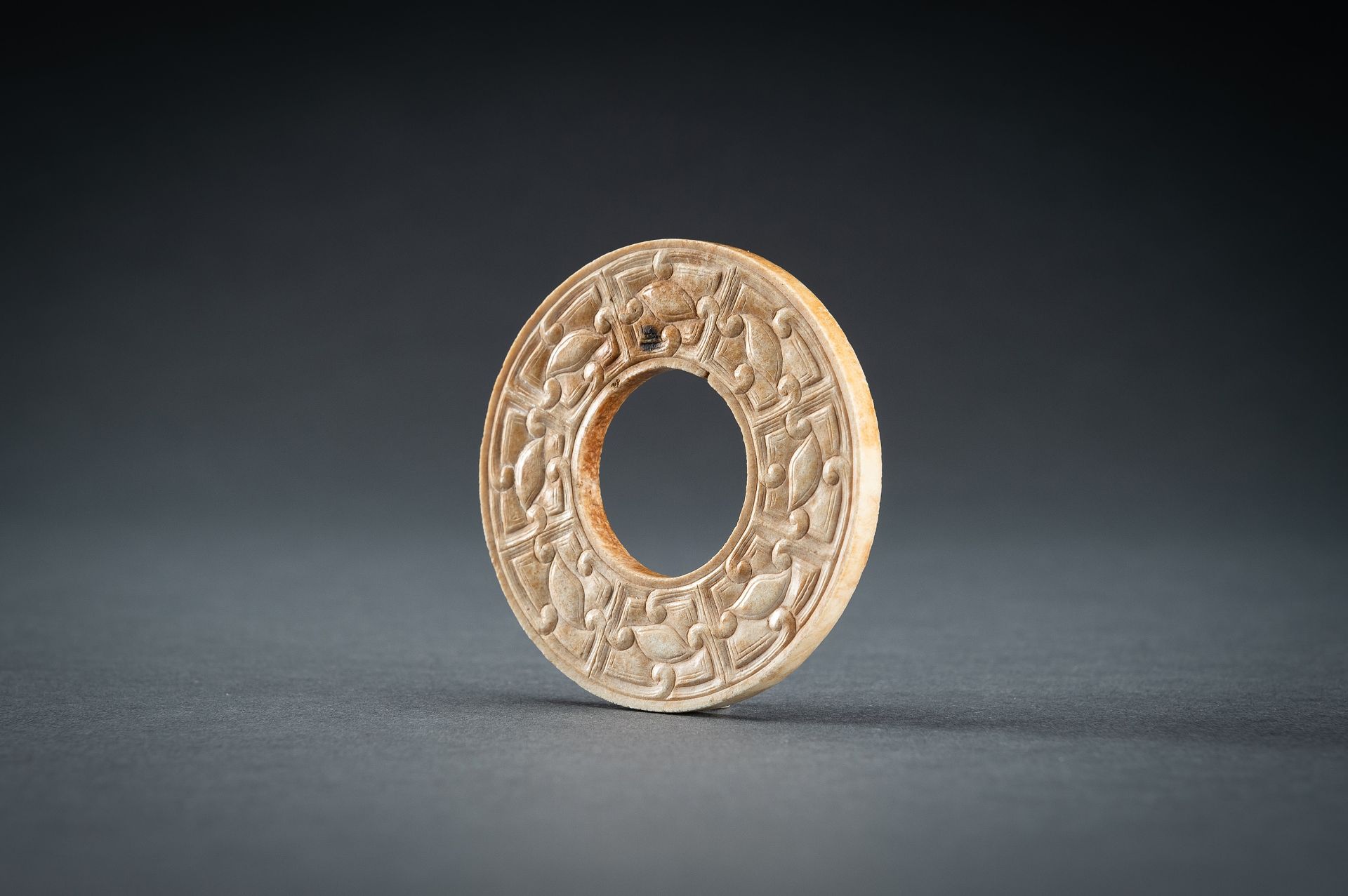 A SMALL OCHRE JADE ARCHAISTIC BI DISC, QING - Image 6 of 15
