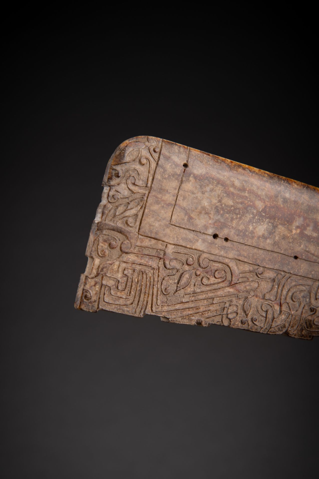 A FINELY DECORATED BROWN JADE AXE, QING - Image 10 of 13