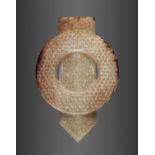 AN ARCHAISTIC PALE YELLOW AND RUSSET JADE DISC AND BLADE, GUIBI, QING