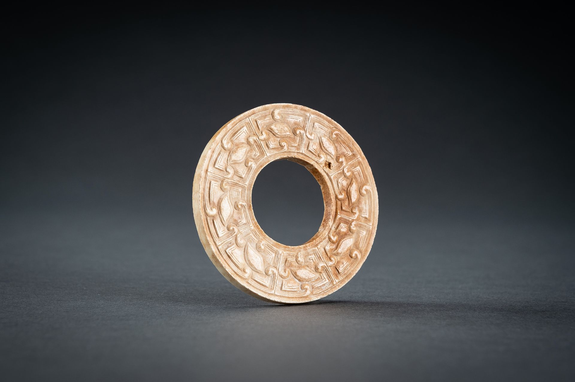 A SMALL OCHRE JADE ARCHAISTIC BI DISC, QING - Image 10 of 15