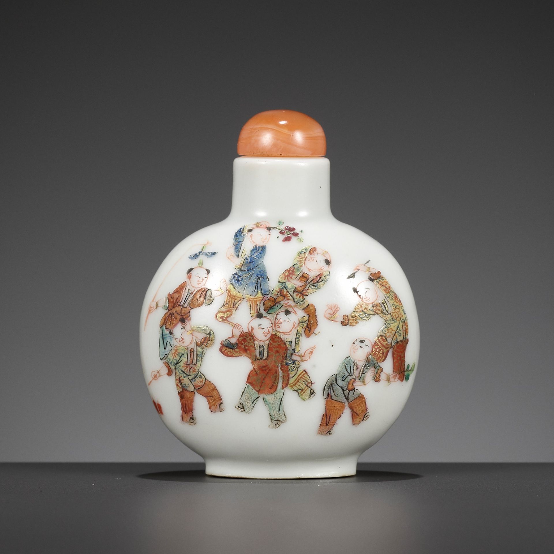 AN IMPERIAL FAMILLE ROSE 'BOYS AT PLAY' PORCELAIN SNUFF BOTTLE, DAOGUANG MARK AND PERIOD