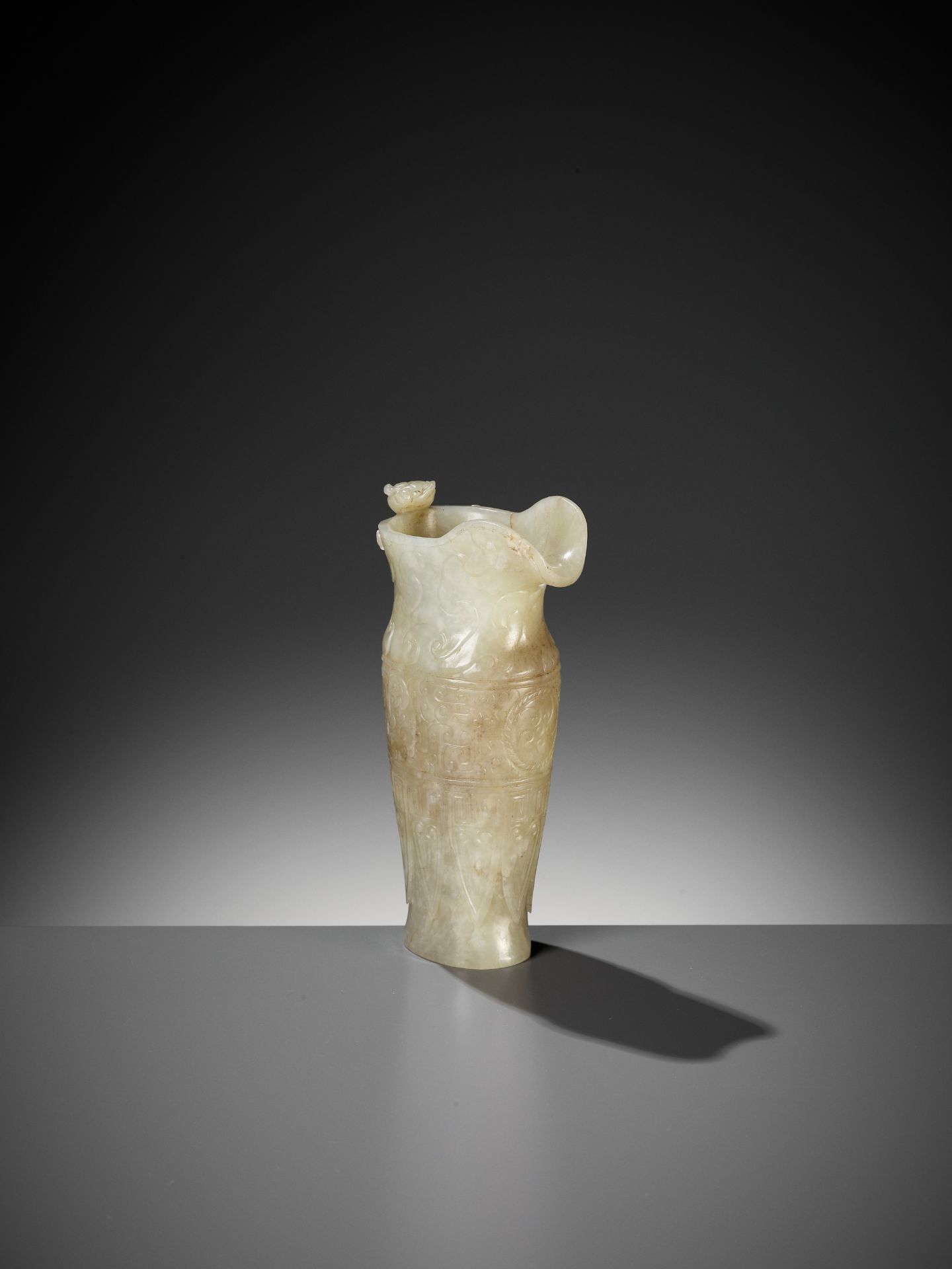 AN IMPERIAL CELADON AND RUSSET JADE 'CHILONG' RHYTON, QIANLONG MARK AND PERIOD - Image 12 of 17