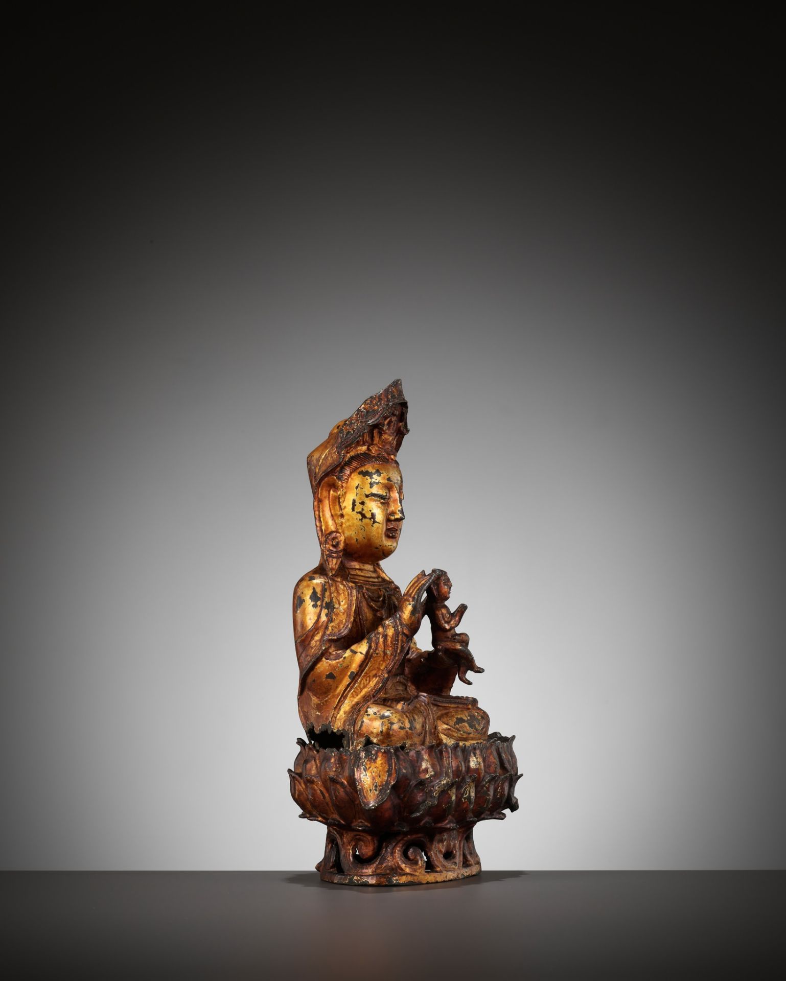 A GILT-LACQUERED BRONZE FIGURE OF SONGZI GUANYIN, MING DYNASTY - Image 10 of 12