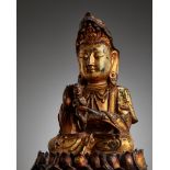 A GILT-LACQUERED BRONZE FIGURE OF SONGZI GUANYIN, MING DYNASTY
