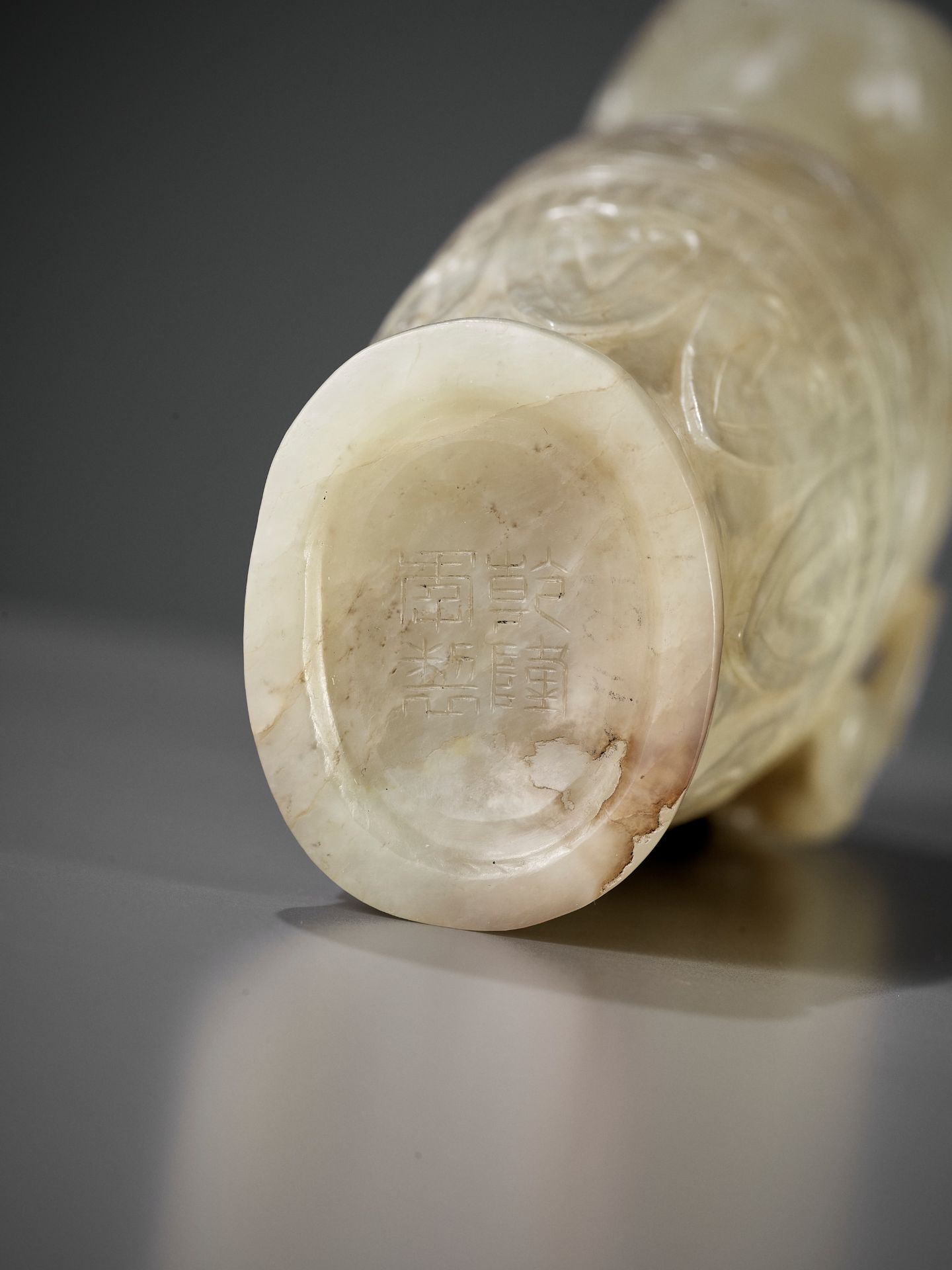 AN IMPERIAL CELADON AND RUSSET JADE 'CHILONG' RHYTON, QIANLONG MARK AND PERIOD - Image 2 of 17