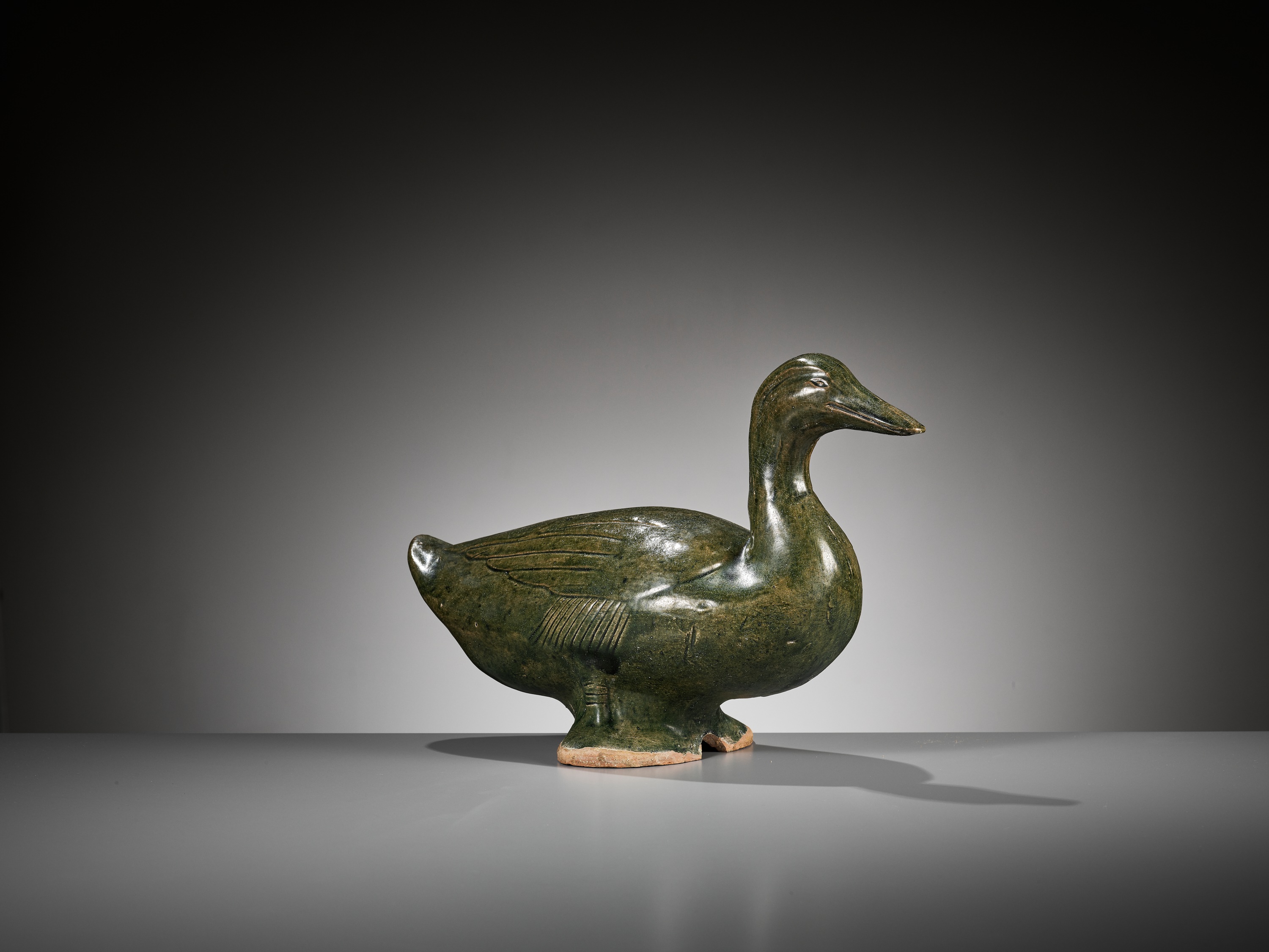 A GREEN GLAZED POTTERY FIGURE OF A DUCK, HAN DYNASTY - Image 6 of 9
