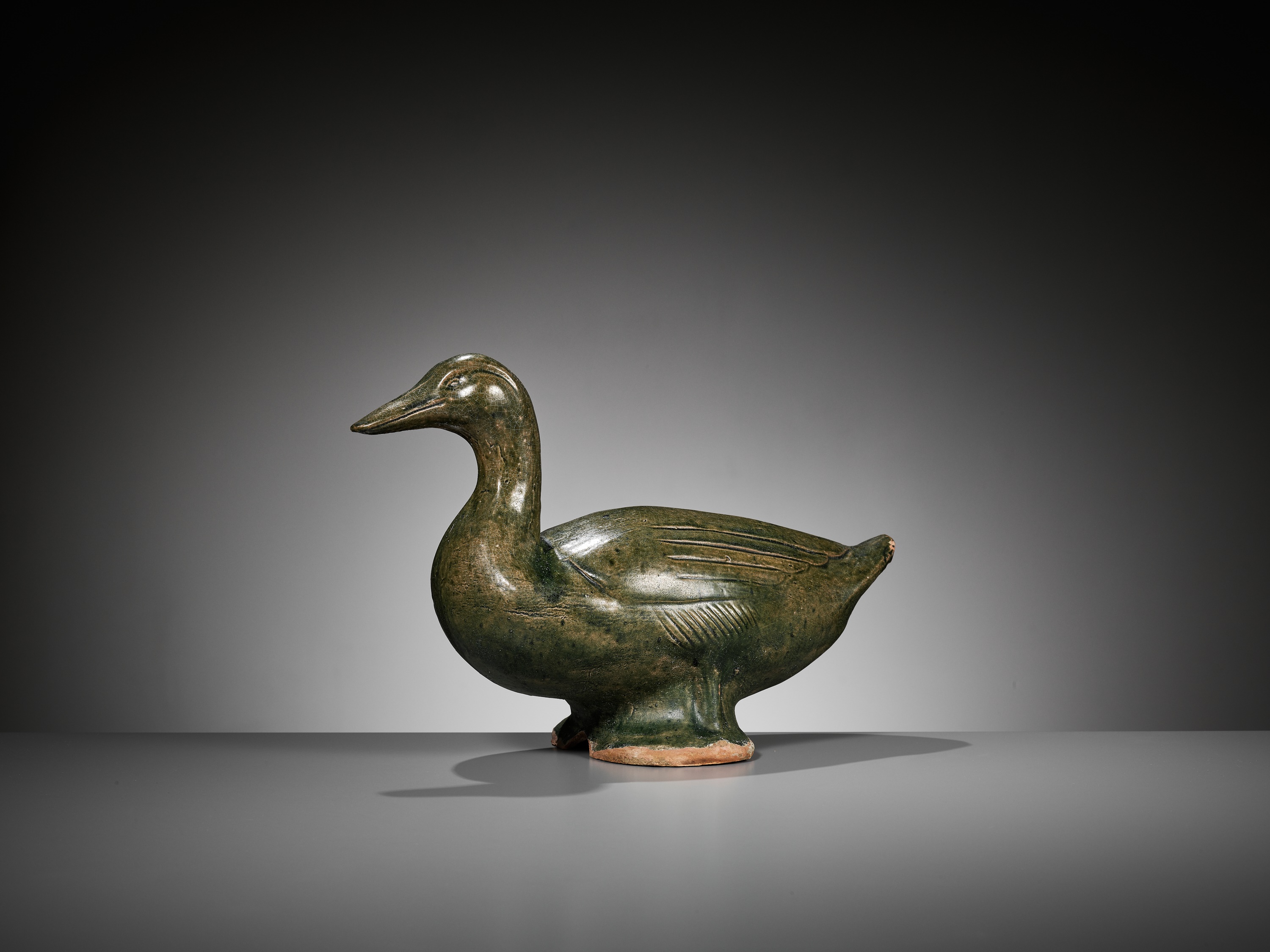 A GREEN GLAZED POTTERY FIGURE OF A DUCK, HAN DYNASTY - Image 2 of 9