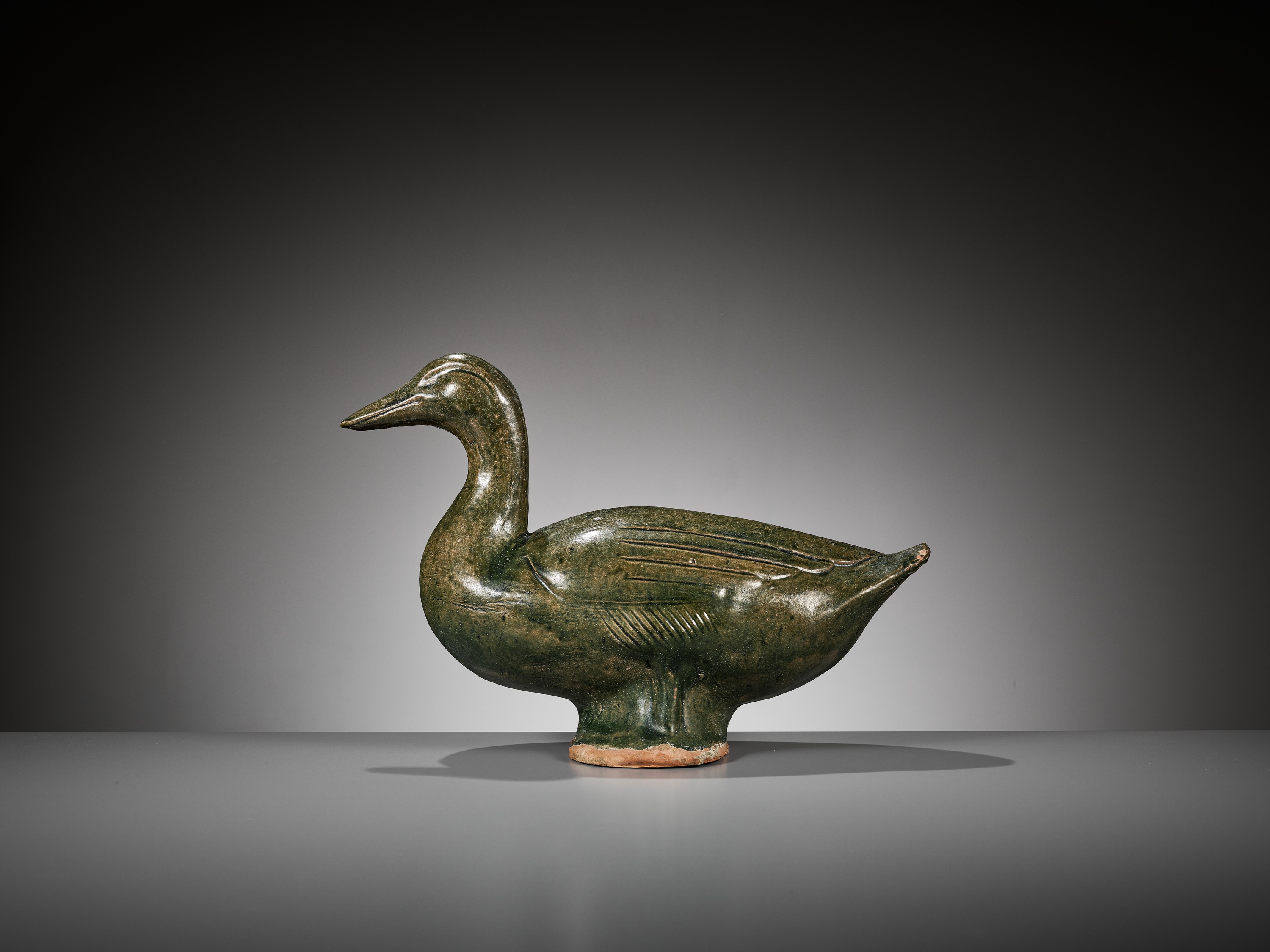 A GREEN GLAZED POTTERY FIGURE OF A DUCK, HAN DYNASTY - Image 4 of 9