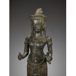 A RARE BRONZE FIGURE OF UMA, ANGKOR WAT STYLE, KHMER EMPIRE, 12TH CENTURY