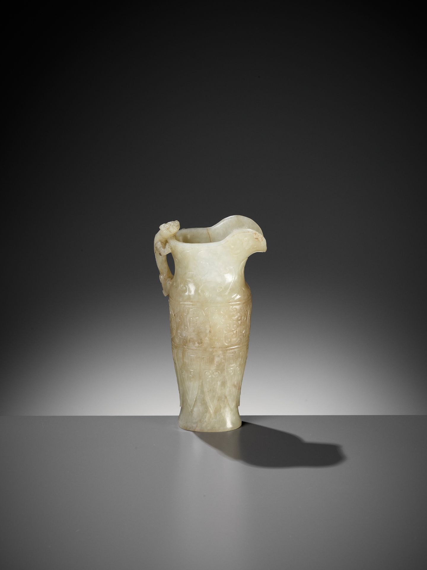 AN IMPERIAL CELADON AND RUSSET JADE 'CHILONG' RHYTON, QIANLONG MARK AND PERIOD - Image 11 of 17