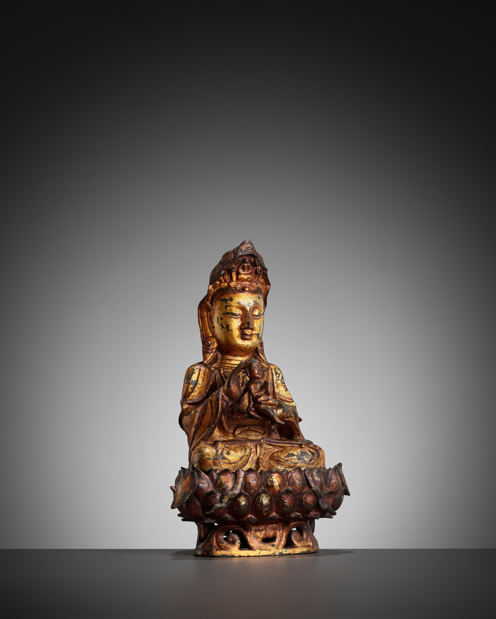 A GILT-LACQUERED BRONZE FIGURE OF SONGZI GUANYIN, MING DYNASTY - Image 6 of 12