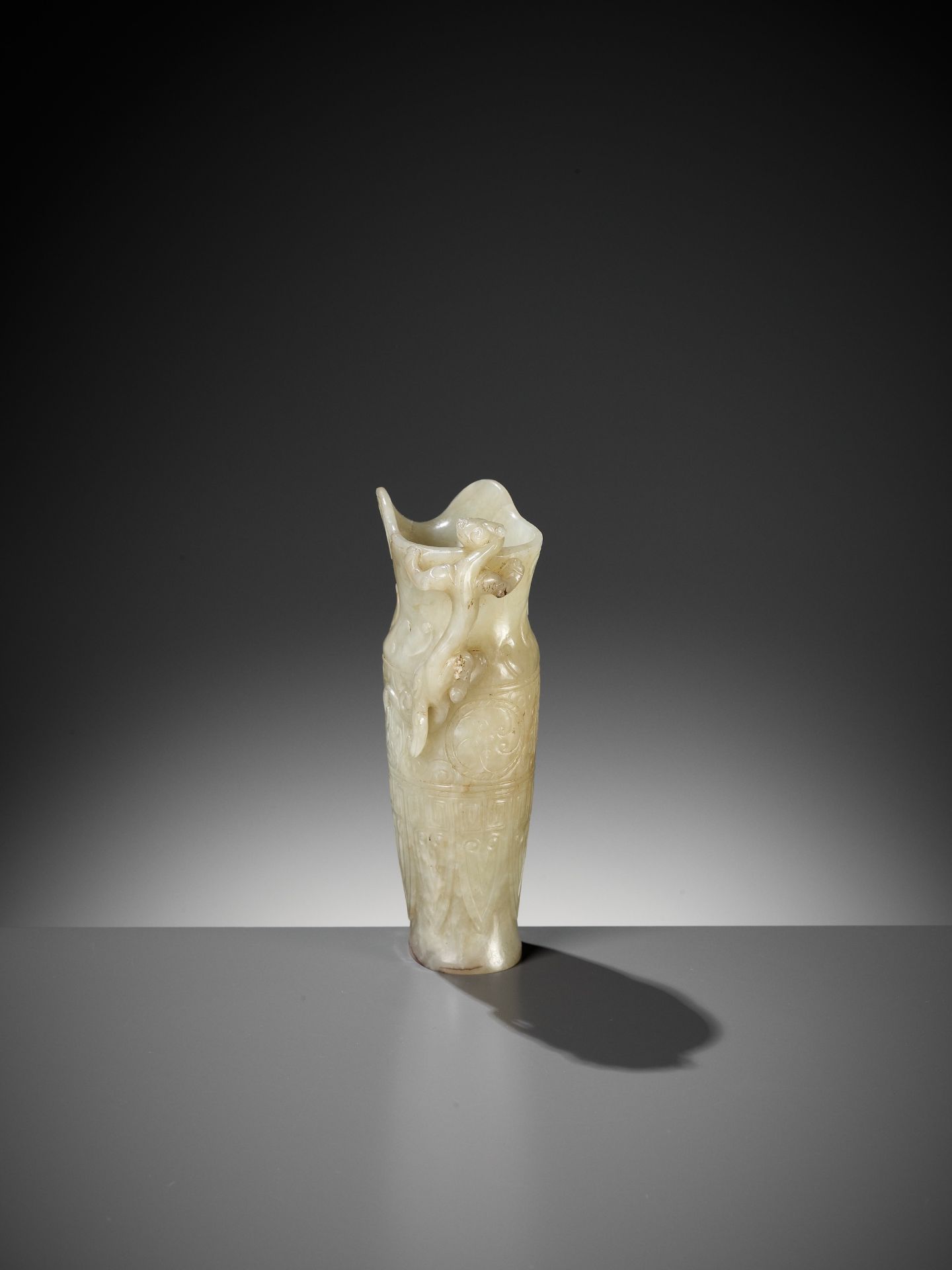 AN IMPERIAL CELADON AND RUSSET JADE 'CHILONG' RHYTON, QIANLONG MARK AND PERIOD - Image 9 of 17