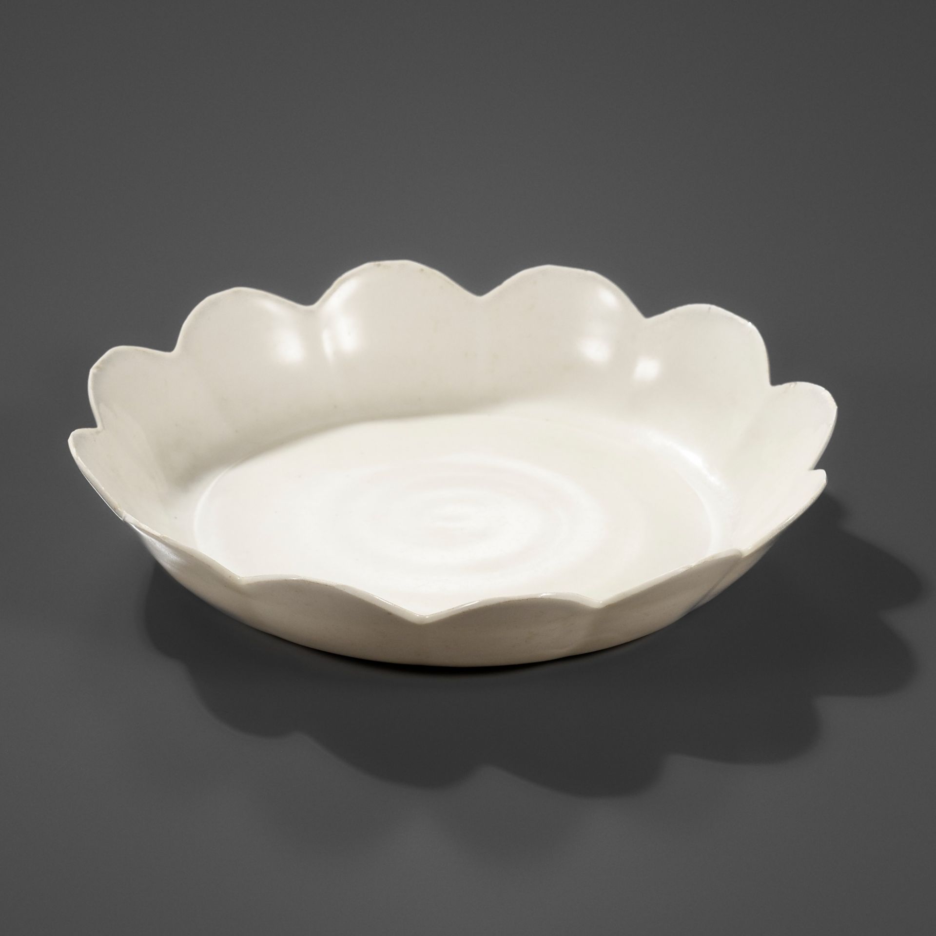 AN EXTREMELY RARE DINGYAO PETAL-LOBED DISH, SONG DYNASTY