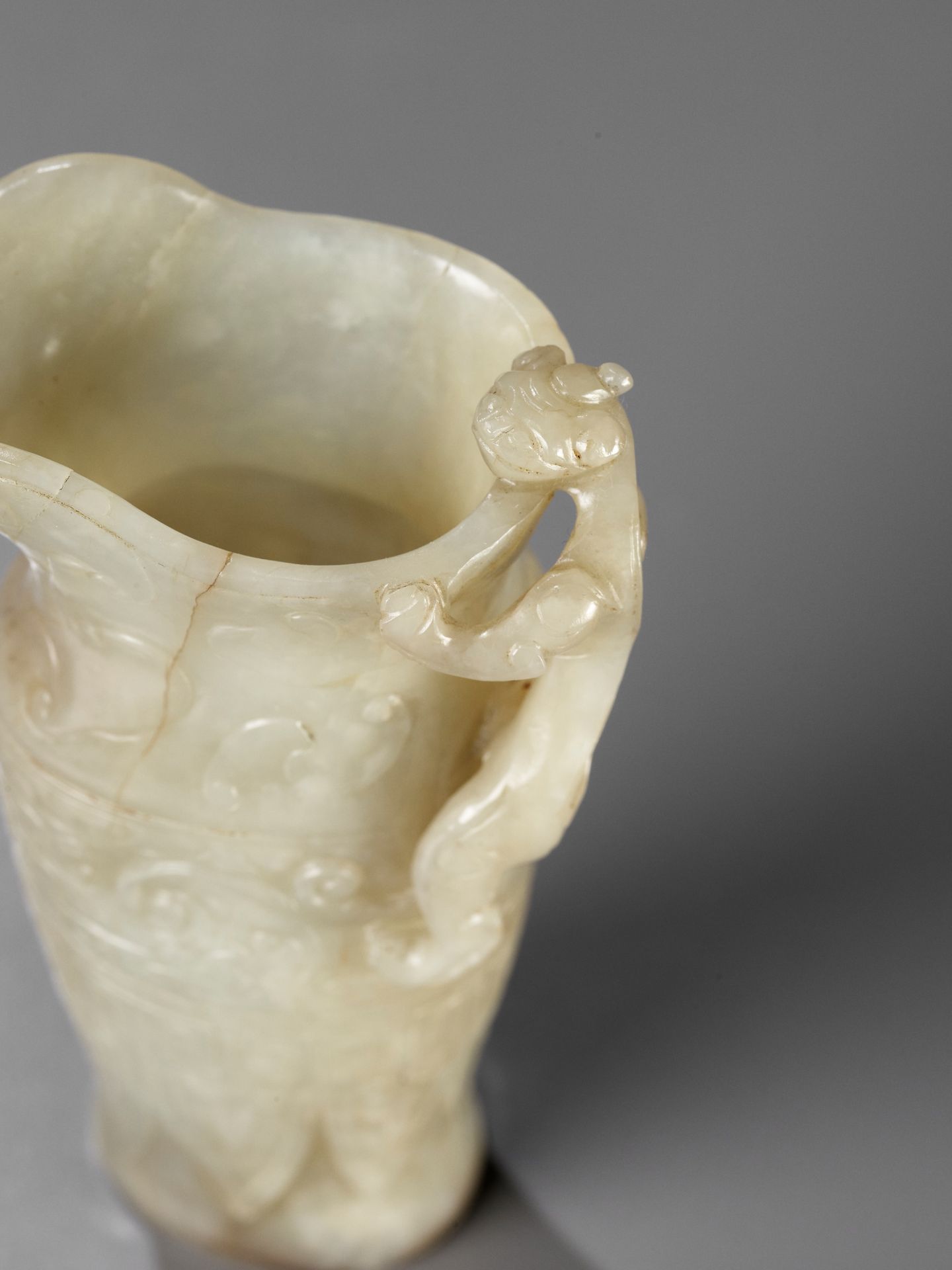 AN IMPERIAL CELADON AND RUSSET JADE 'CHILONG' RHYTON, QIANLONG MARK AND PERIOD - Image 3 of 17