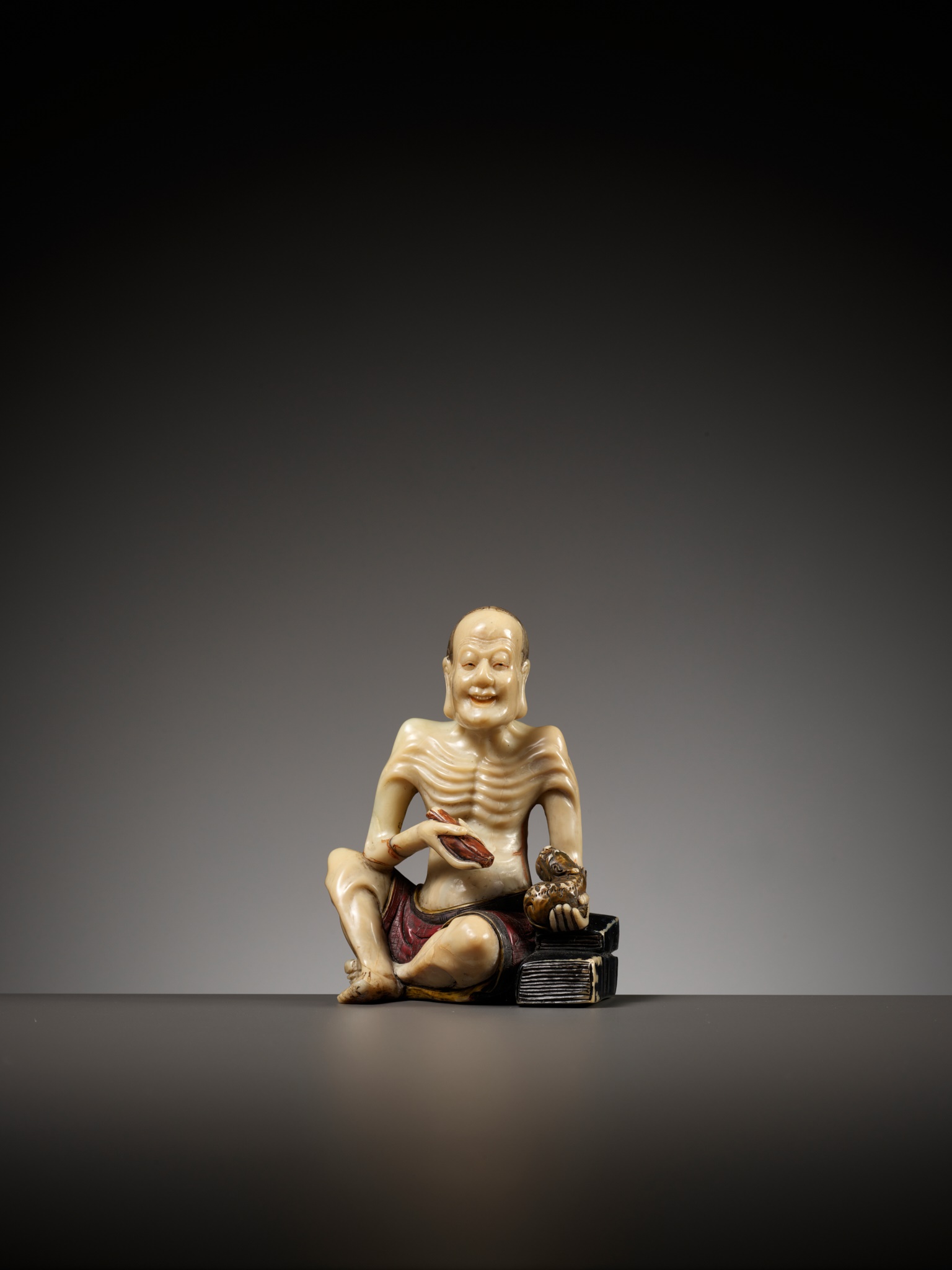 A SOAPSTONE FIGURE OF VIJRAPUTRA, MID-QING DYNASTY - Image 2 of 15