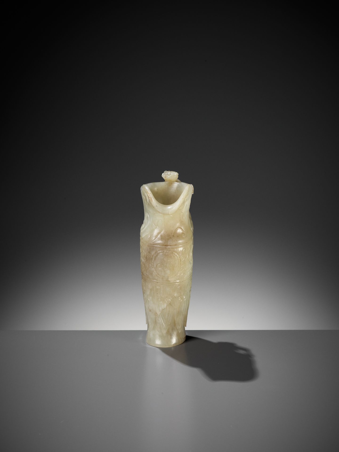 AN IMPERIAL CELADON AND RUSSET JADE 'CHILONG' RHYTON, QIANLONG MARK AND PERIOD - Image 13 of 17